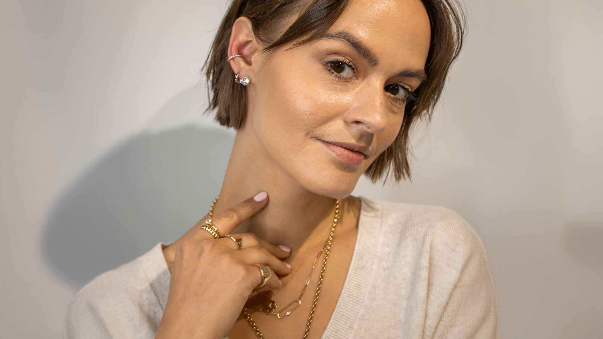 Diamond stud earrings on model | Lia Robin