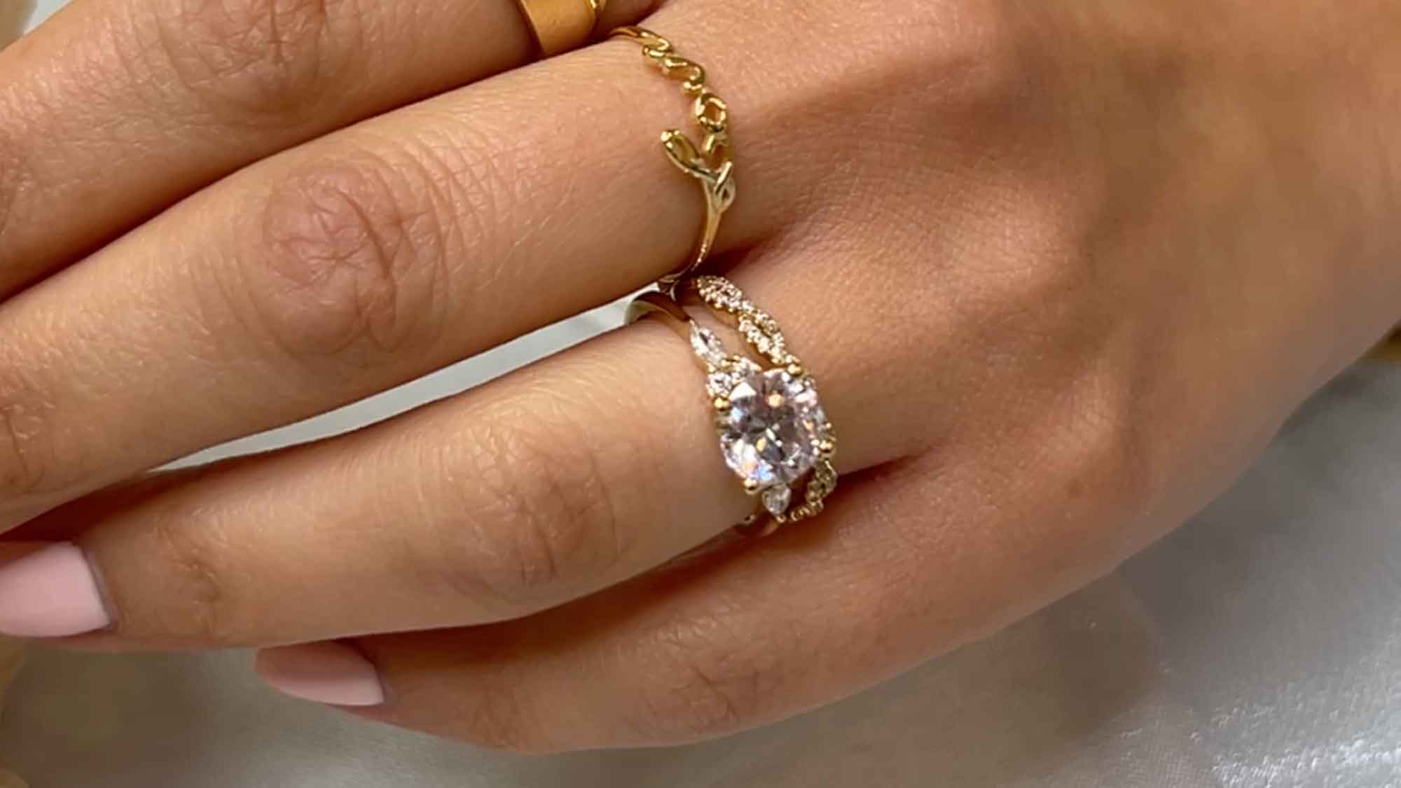 The Sophia enaggement ring ad the Quinn twist wedding ring on model | Lisa Robin