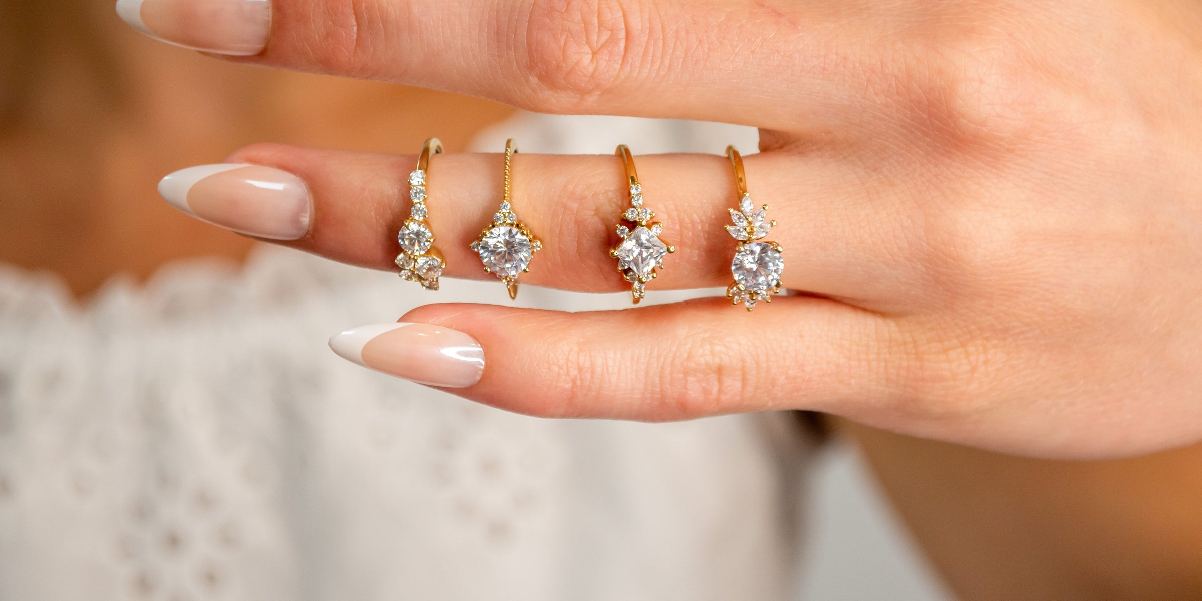 Cluster diamond engagement rings styles displayed on model | Lisa Robin