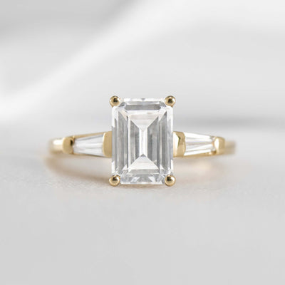 Shown in 1.0 carat * The Devon Three Stone Engagement Ring with Baguettes#shape_emerald