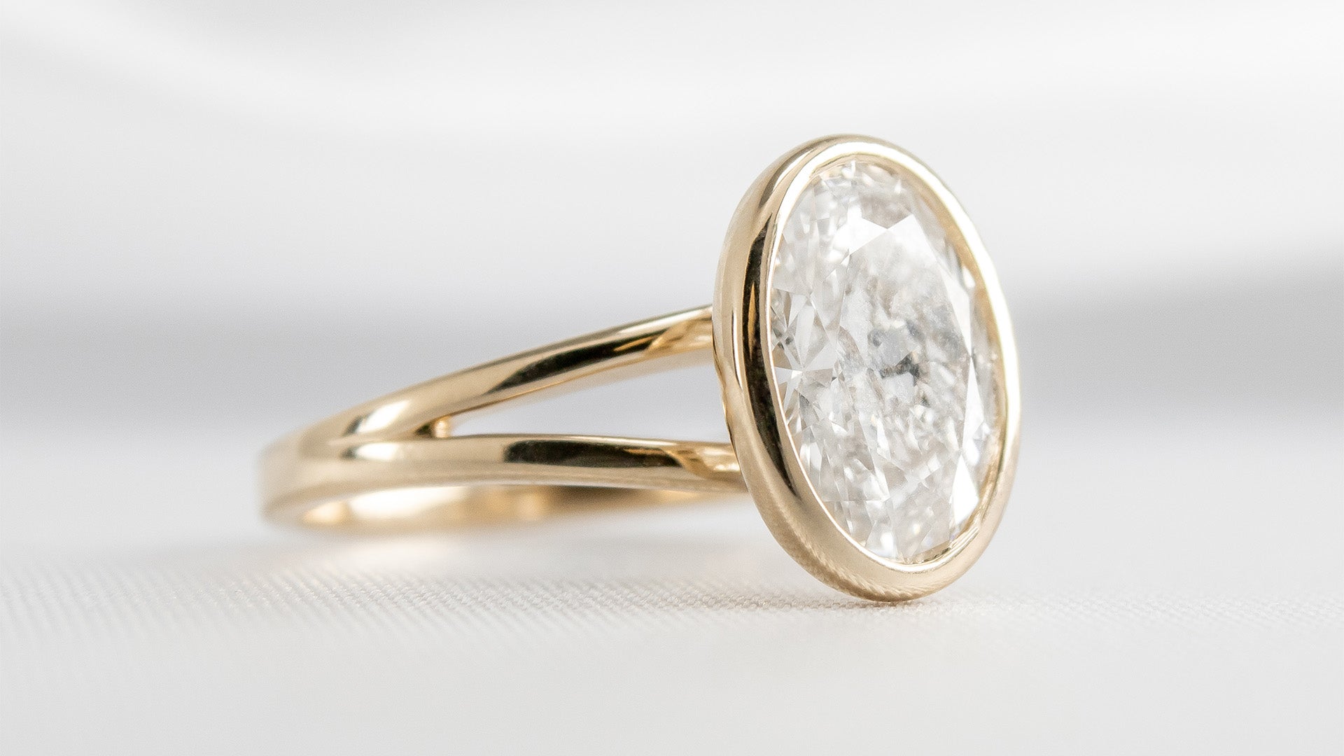 Emery Oval Diamond Bezel Engagement Ring | Lisa Robin