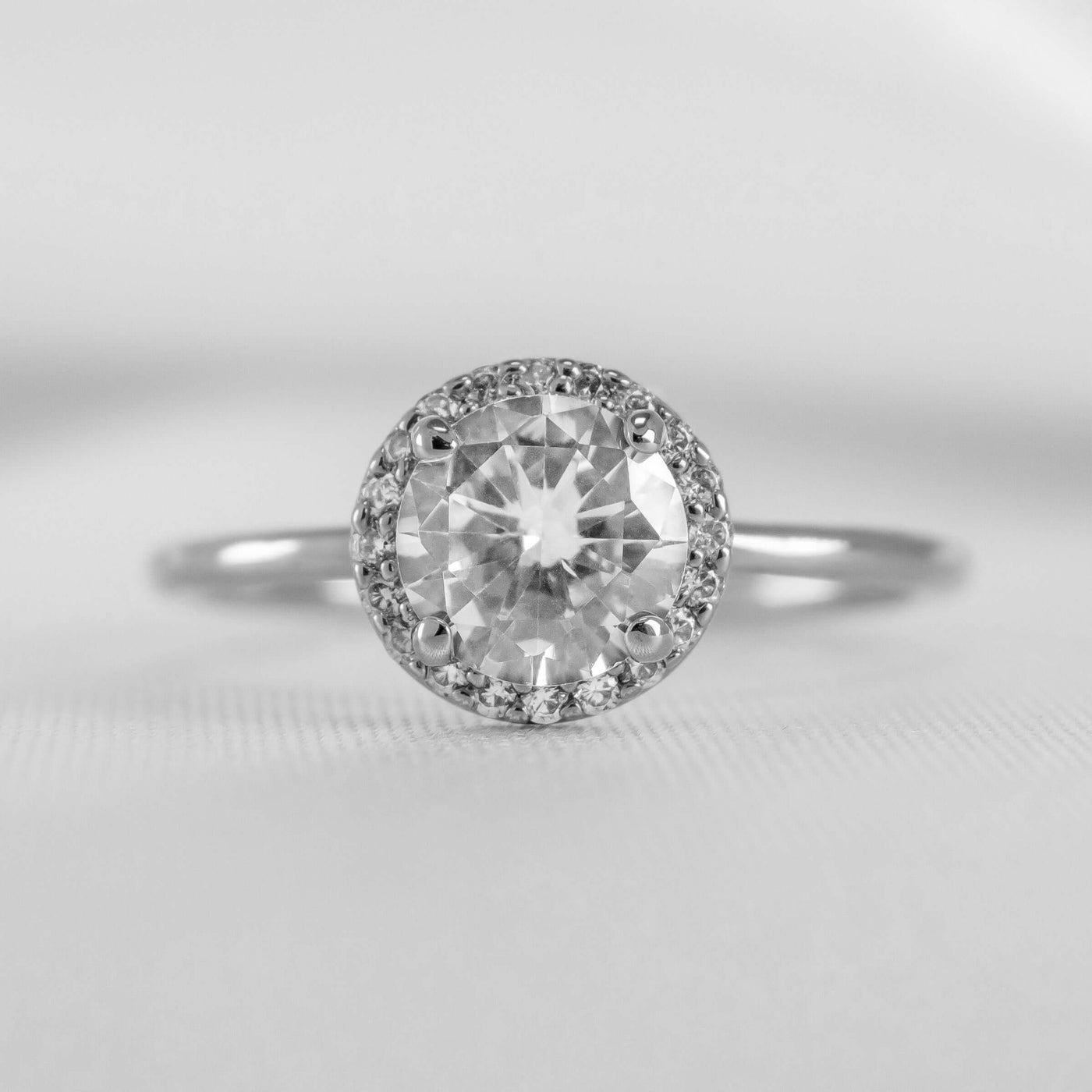 Shown in 1.0 Carat * The Emma Round DiamondHalo Engagement Ring in white Gold | Lisa Robin#color_18k-white-gold
