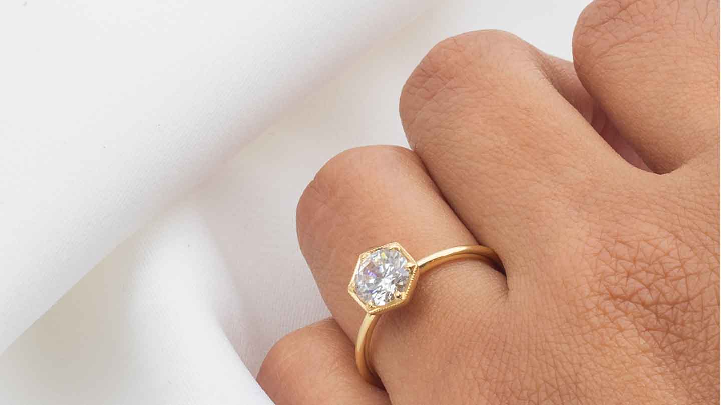 Genevieve Vintage Style Hexagon Diamond Engagement Ring in Yellow Gold on hand | Lisa Robin