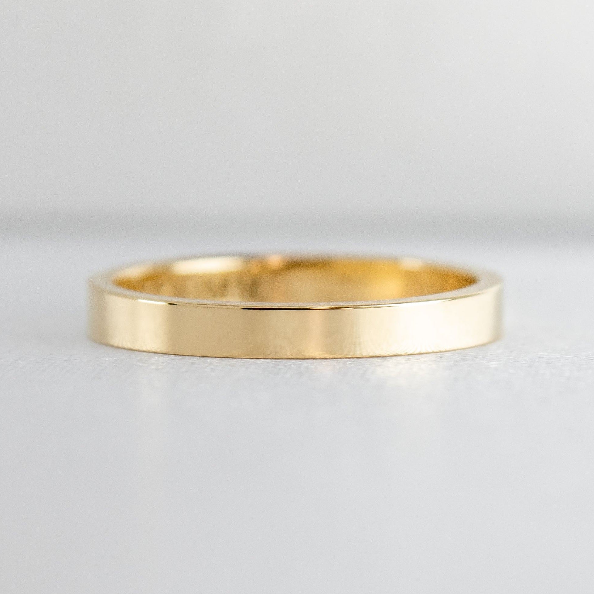 The Jamie 2mm wide Flat 14K yellow gold Wedding ring front view by Lisa Robin#color_14k-yellow-gold