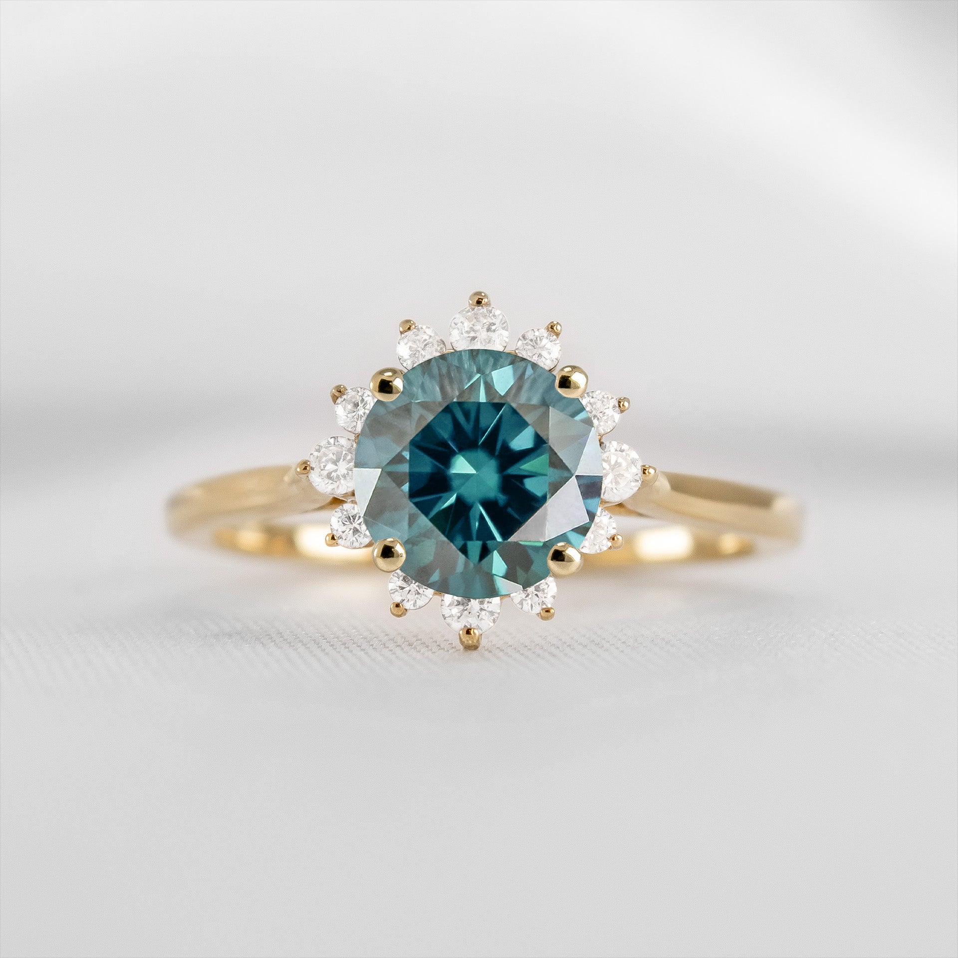 Shown in 1.5 carat Teal Sapphire*The Jaylin Halo Sapphire and Diamond Engagement Ring | Lisa Robin#color_14k-yellow-gold