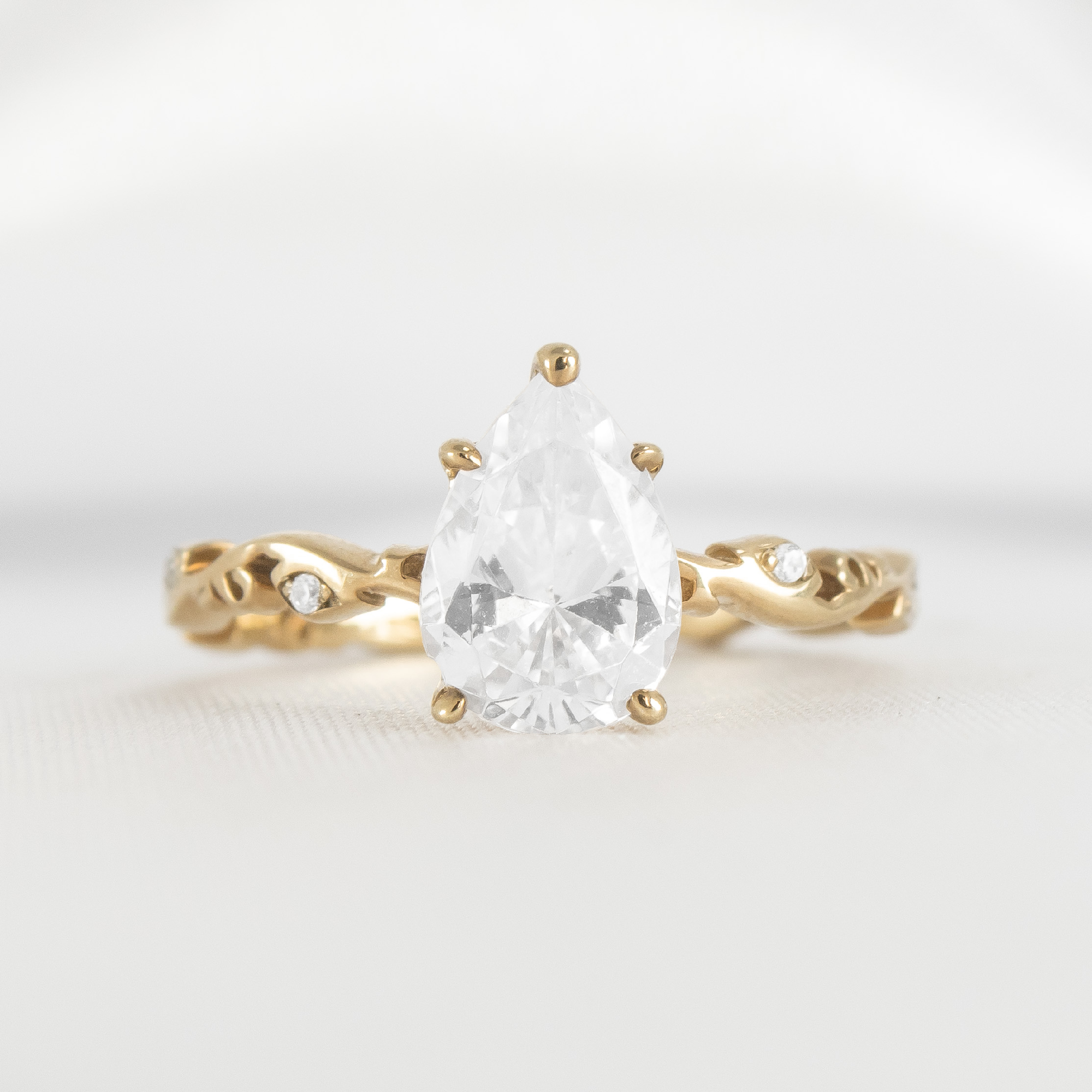 Shown in 2 Carat Diamond*The Laurel Leaf and Vine Engagement Ring with pear cut diamond in yellow gold from the front by Lisa Robin#color_14k-yellow-gold