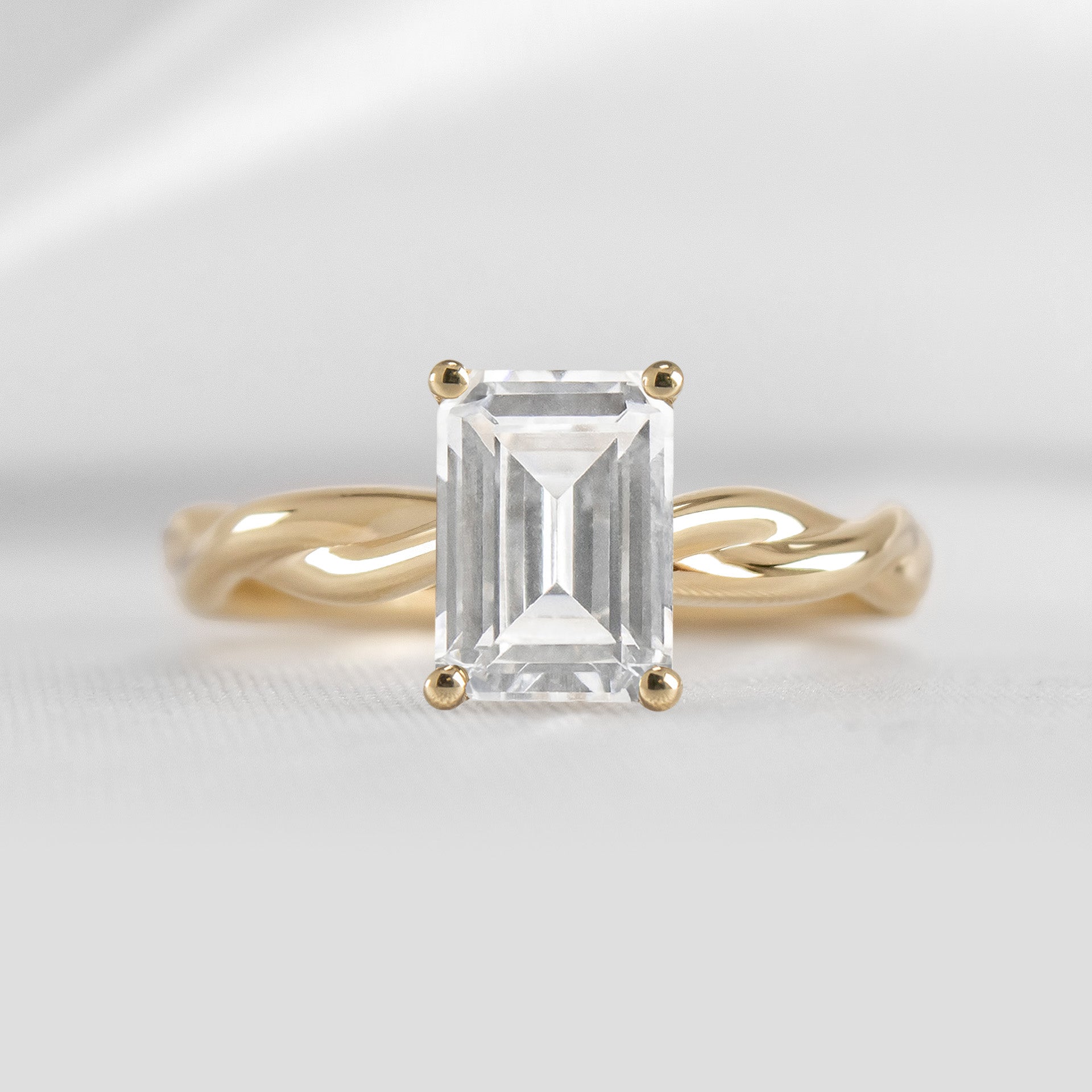 Shown in 1.5 Carat*The Leila Twist Engagement Ring with emerald cut diamond in yellow gold by Lisa Robin#color_14k-yellow-gold#shape_emerald