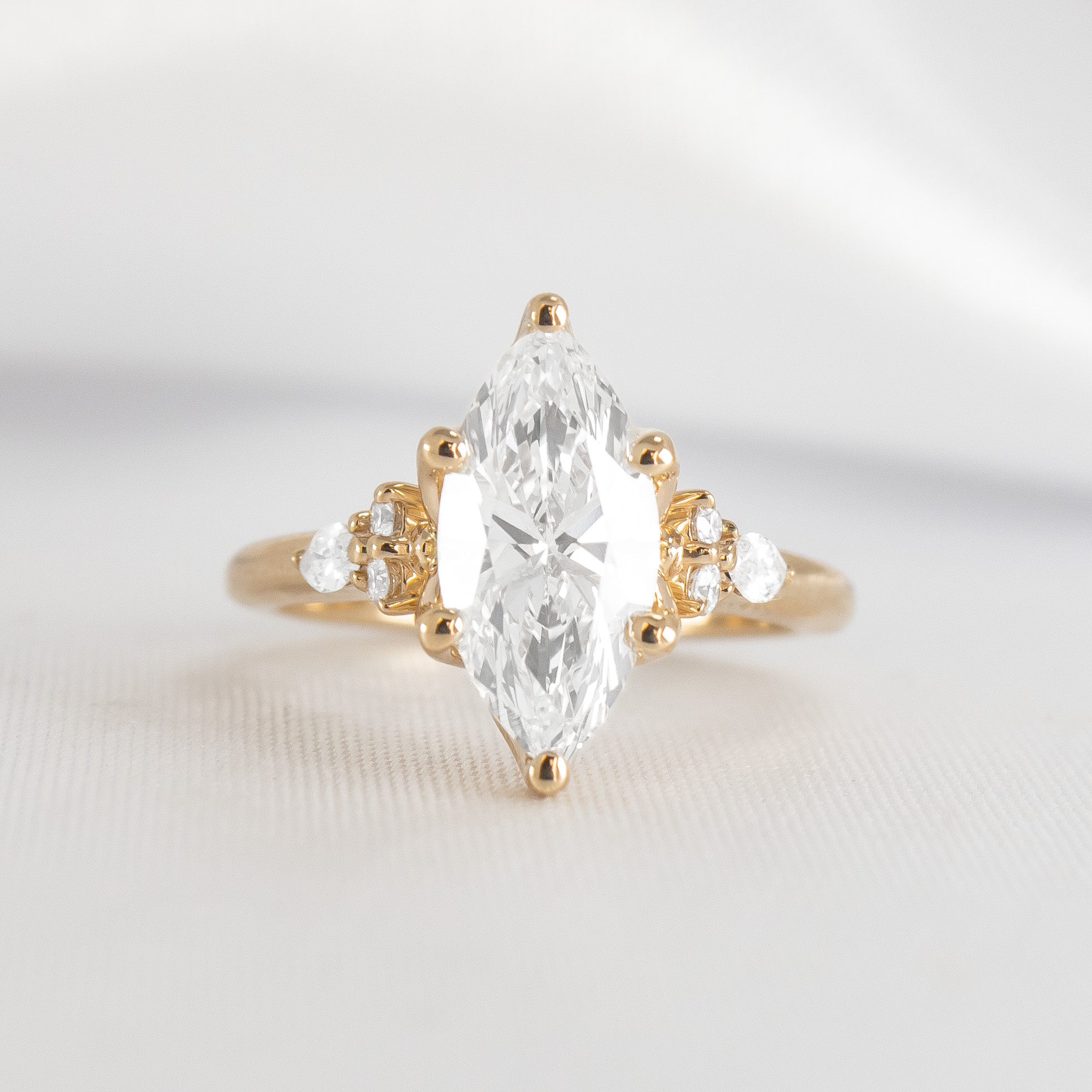 Shown in 2 Carat Diamond*The Meredith cathedral Engagement Ring with marquise cut diamond in yellow gold from the front by Lisa Robin#color_14k-yellow-gold