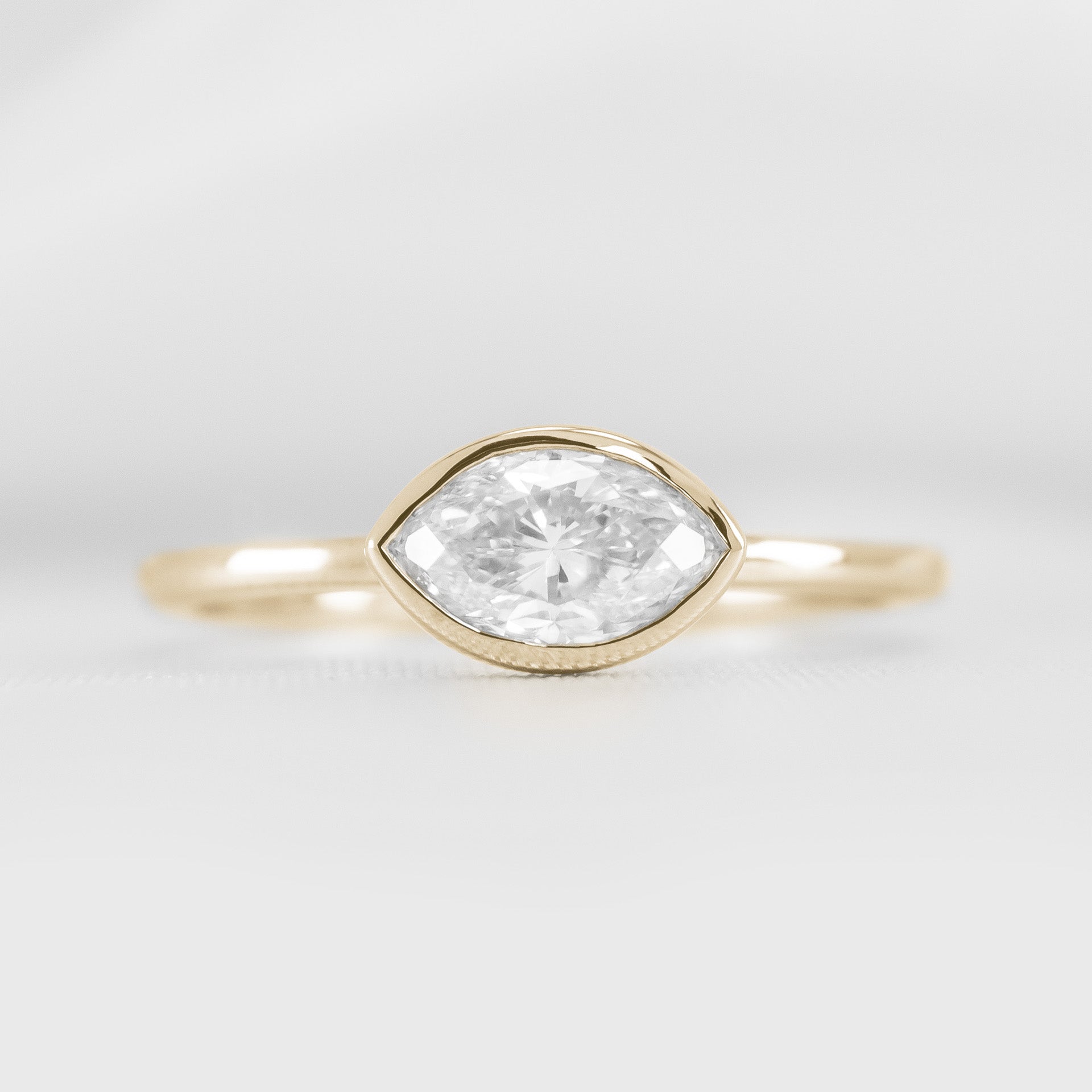 Shown in 1.0 Carat * The Nova Bezel East West Diamond Ring | Lisa Robin#color_14k-yellow-gold