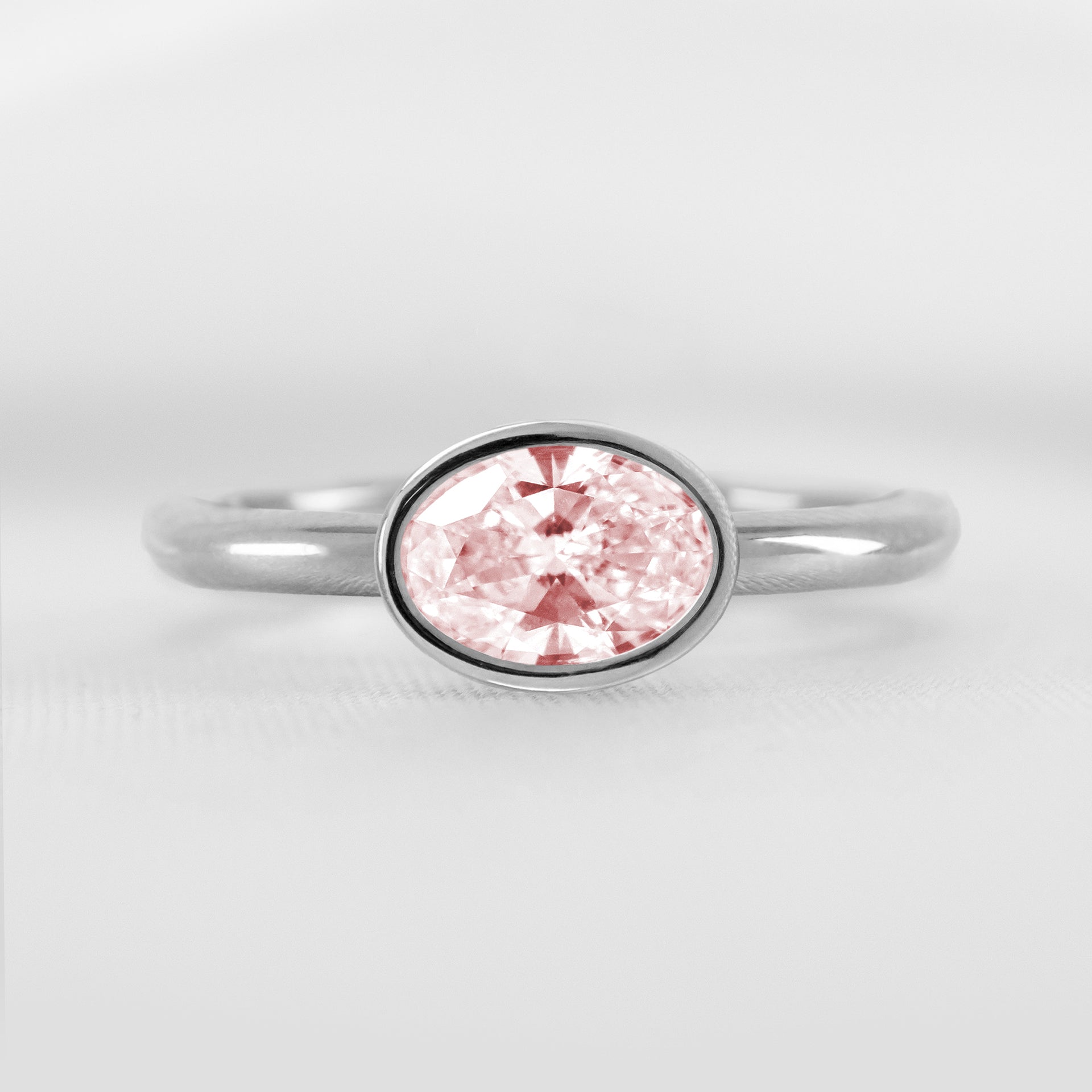 The Nova Pink Diamond East-West Bezel Engagement Ring