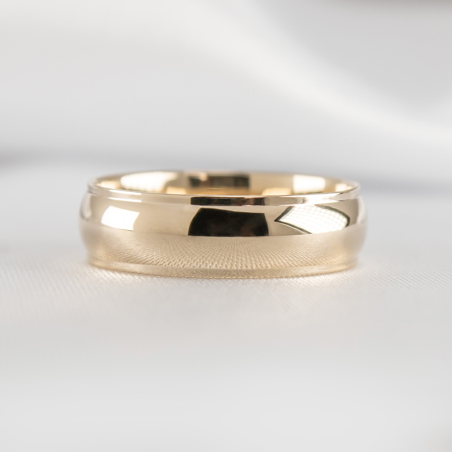 The Percy domed and step edge 14K yellow gold wedding ring by Lisa Robin#color_14k-yellow-gold