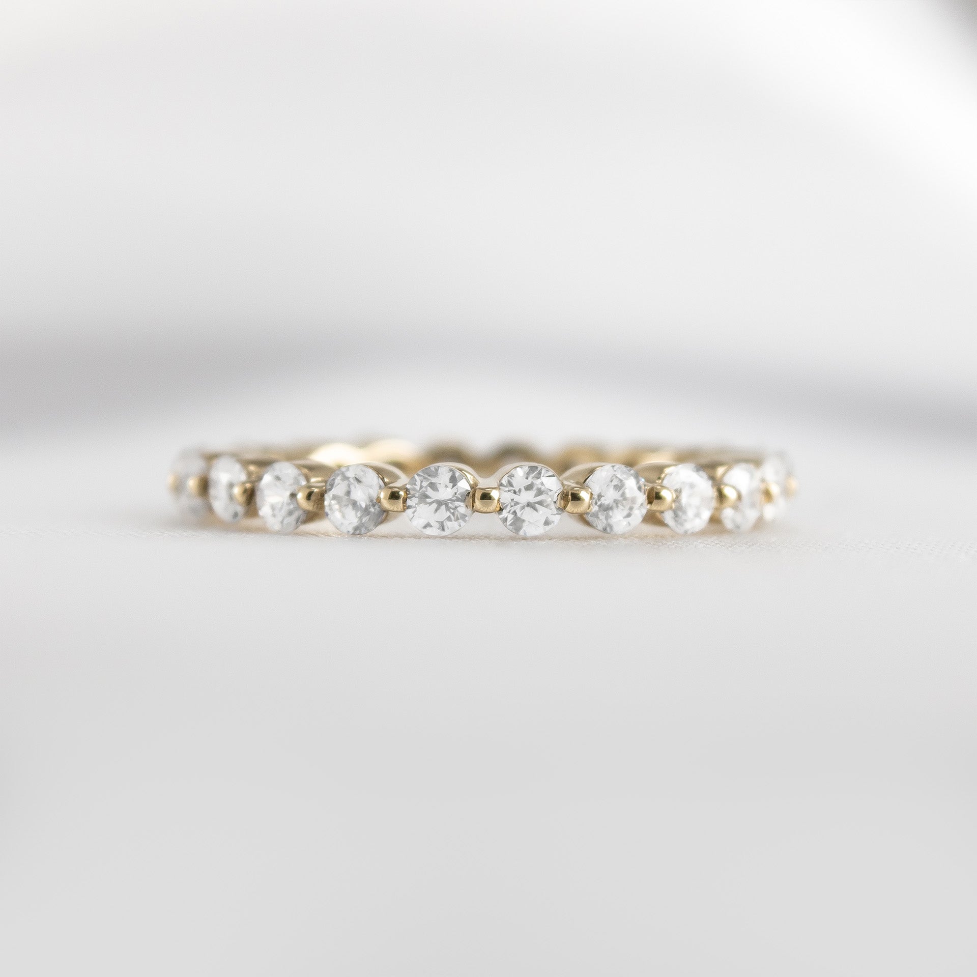 Shown in 2mm width *The Tristan Floating Diamond Eternity Ring | Lisa Robin#color_14k-yellow-gold