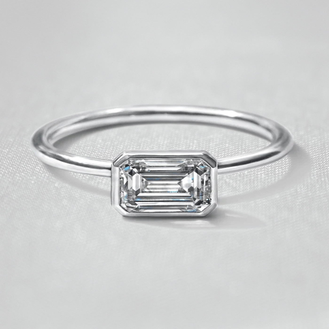 Shown in 1.0 Carat " The Nova East West Bezel Diamond Engagement Ring - Lisa Robin#color_platinum
