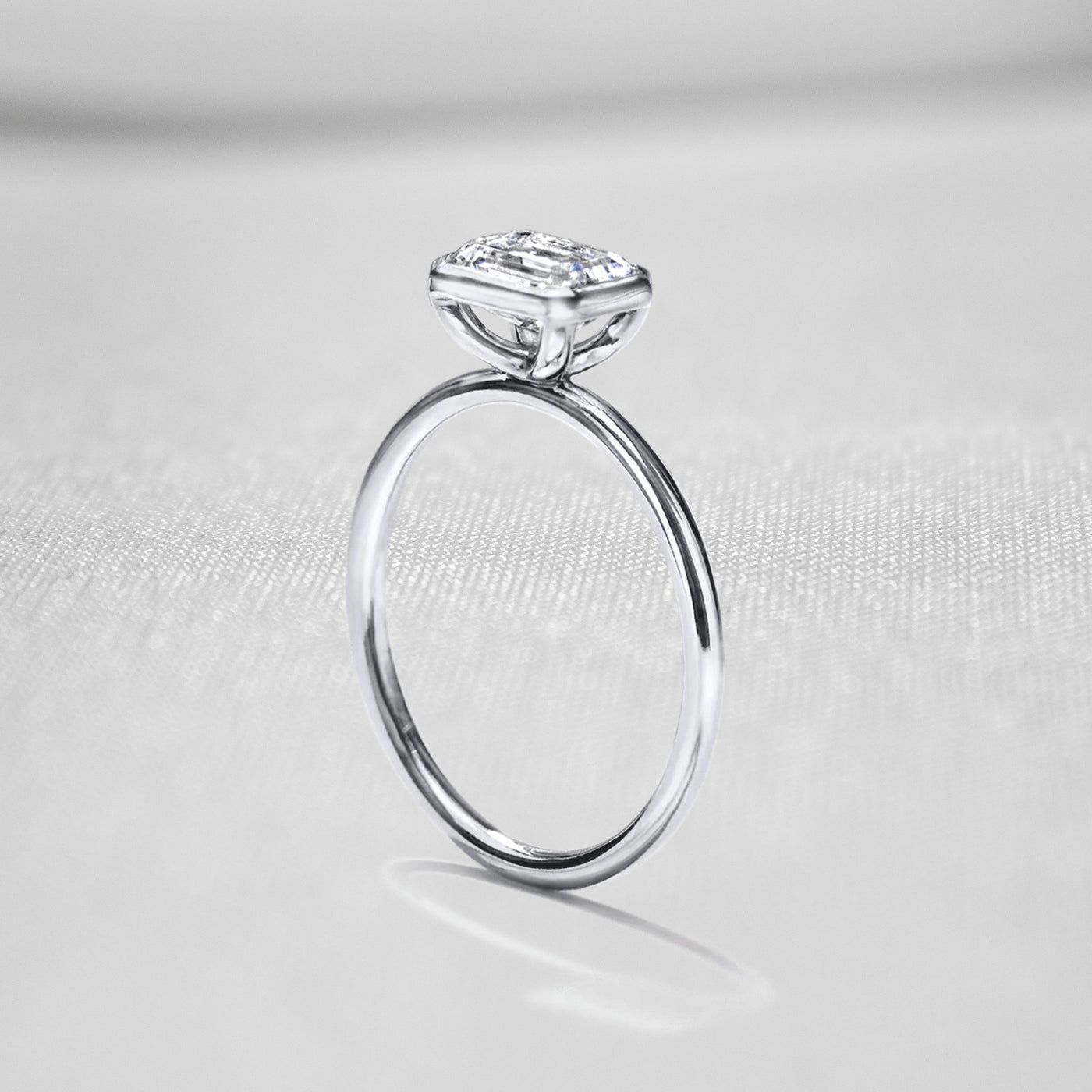 Shown in 1.0 Carat " The Nova East West Bezel Diamond Engagement Ring - Lisa Robin#color_18k-white-gold