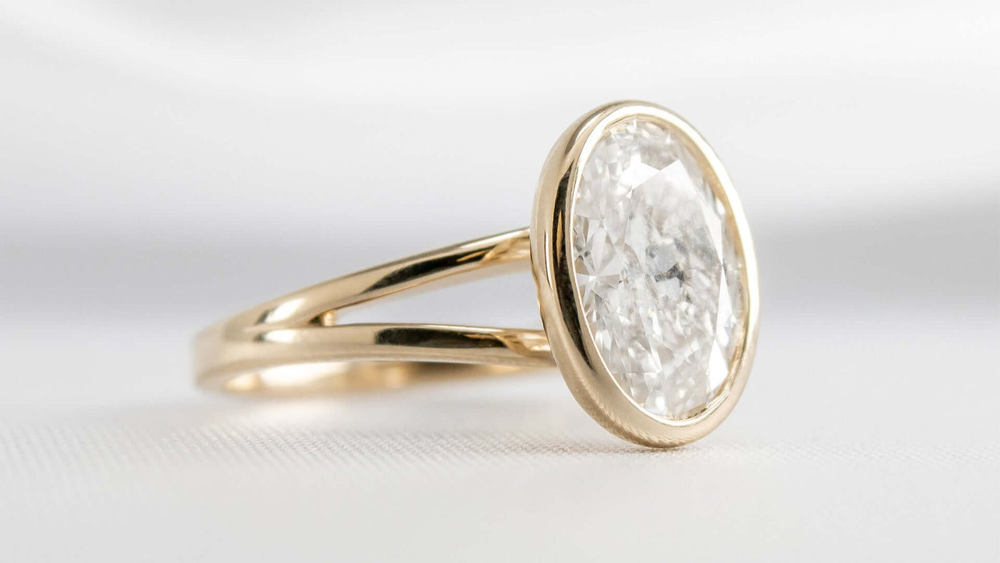 The Emery Oval Diamond Bezel Set Engagement Ring | Lisa Robin