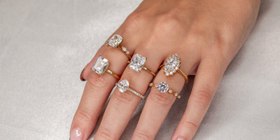 Various shapes of diamond engagement rings on model | Lisa Robin