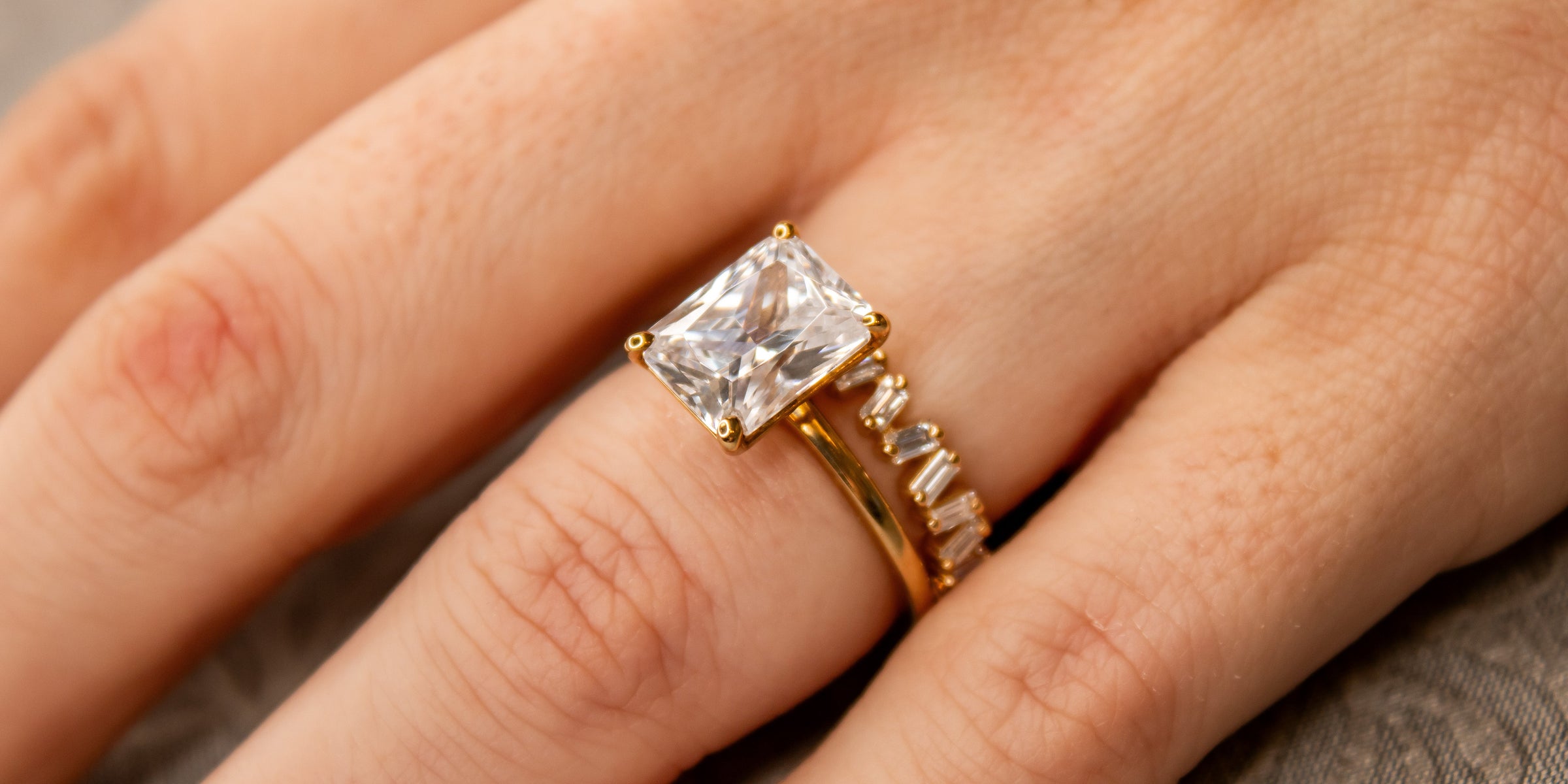 Engagement ring and wedding ring on model | Lisa Robin