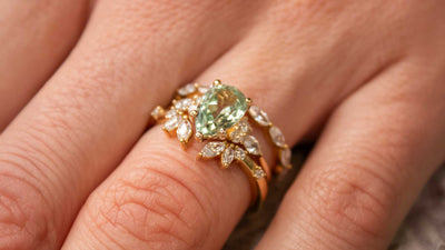 The Sophia Green Sapphire Engagement Rings with wedding rings on model | Lisa Robin