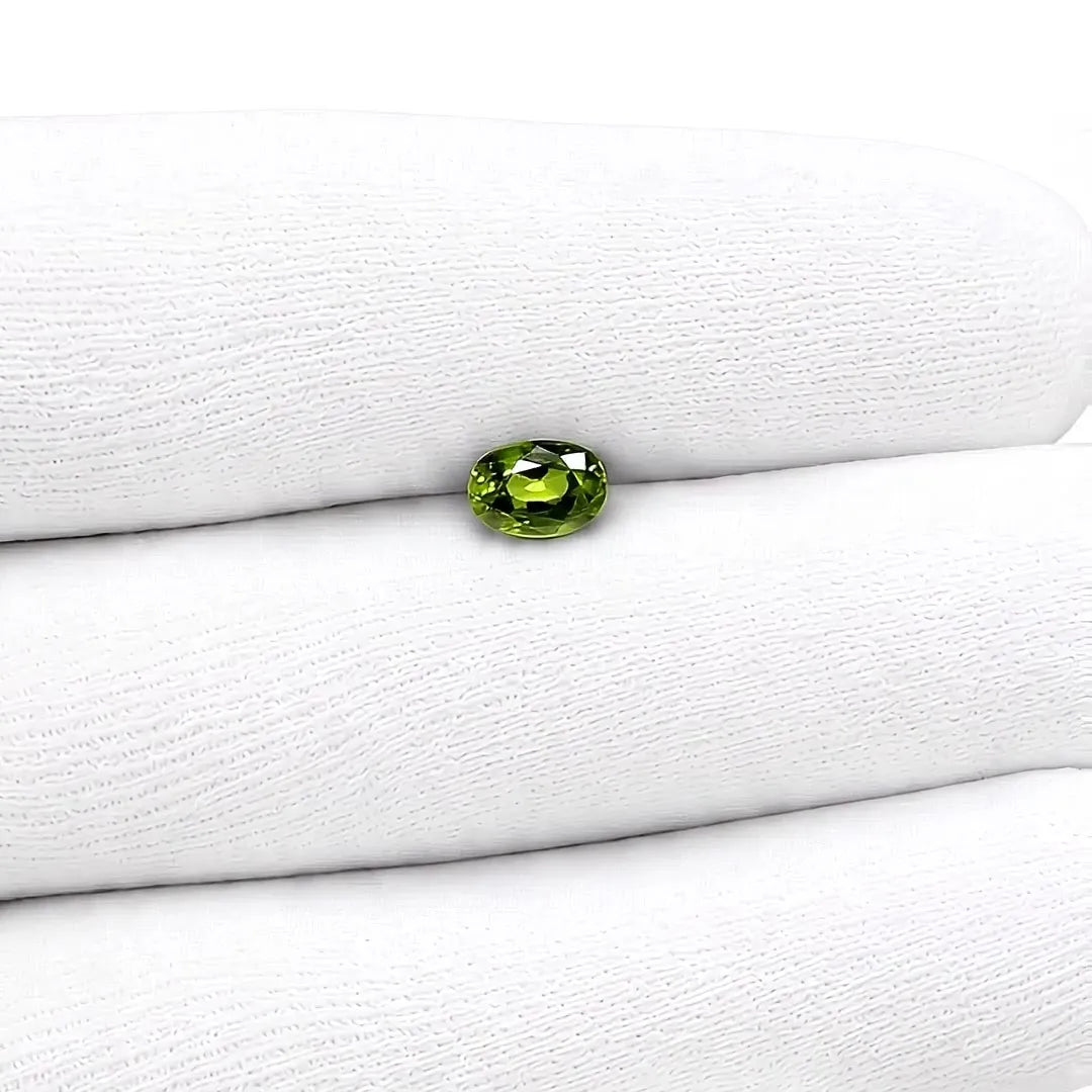 0.91ct Oval Natural Sapphire (Colour Green, Clarity Slightly Included, Cut Faceted)