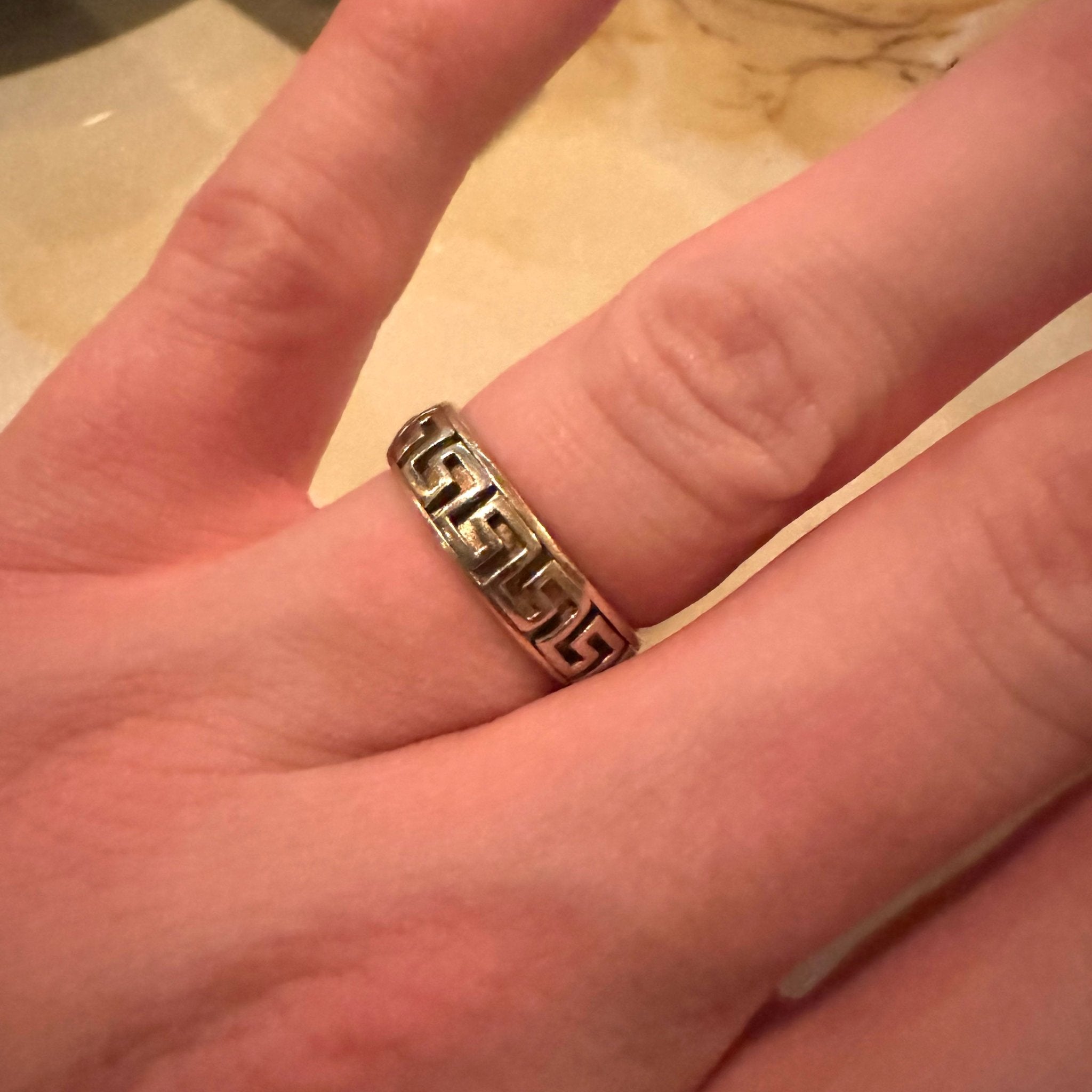 The Adam Greek Key 14K yellow gold wedding ring by Lisa Robin on model square#color_14k-yellow-gold