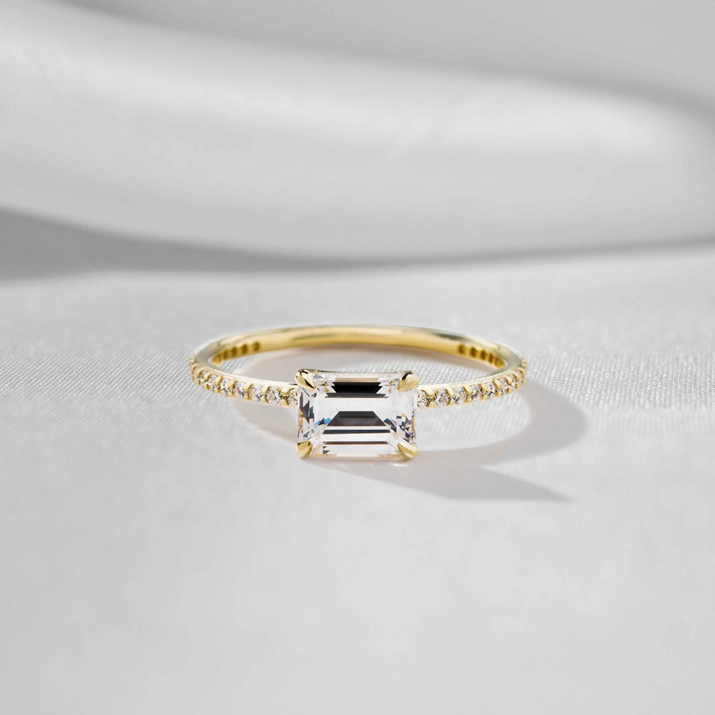 Shown in 1.0 carat * The Adelaide Emerald Cut Diamond East West Pavé Ring | Lisa Robin#color_18k-yellow-gold