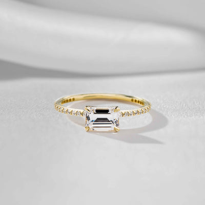 Shown in 1.0 carat * The Adelaide Emerald Cut Diamond East West Pavé Ring | Lisa Robin#color_18k-yellow-gold