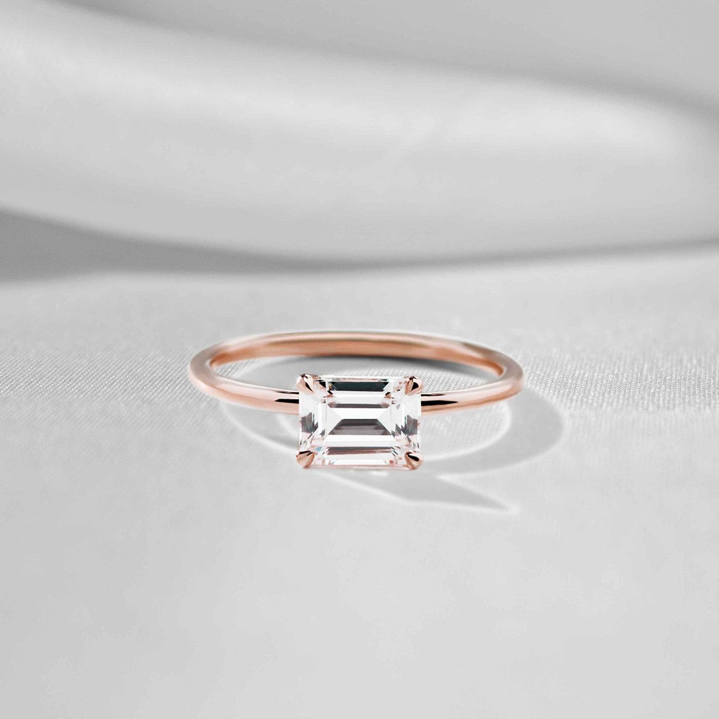 Shown in 1.0 carat * The Adelaide Emerald Cut Diamond East West Pavé Ring | Lisa Robin#color_18k-rose-gold