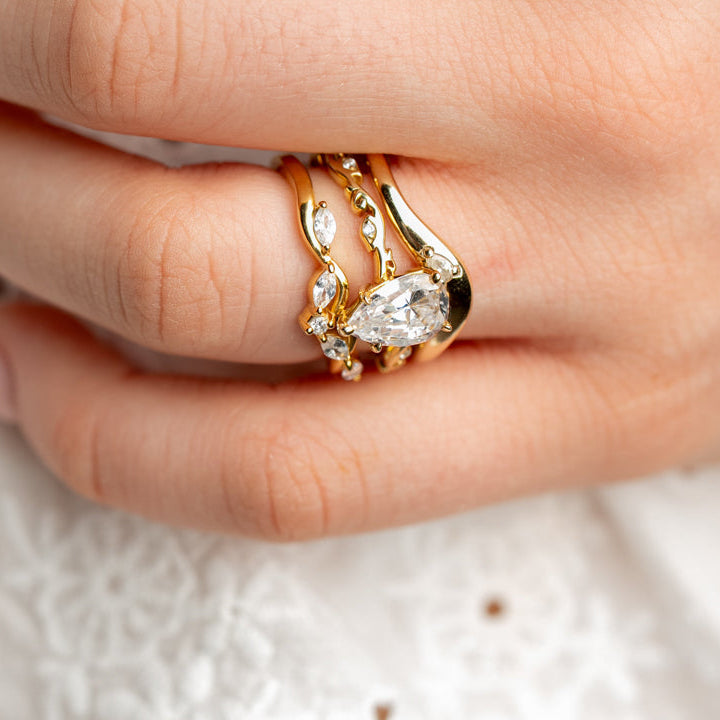 The Finley marquise diamond 14K yellow gold wedding ring on model hand by Lisa Robin#color_14k-yellow-gold