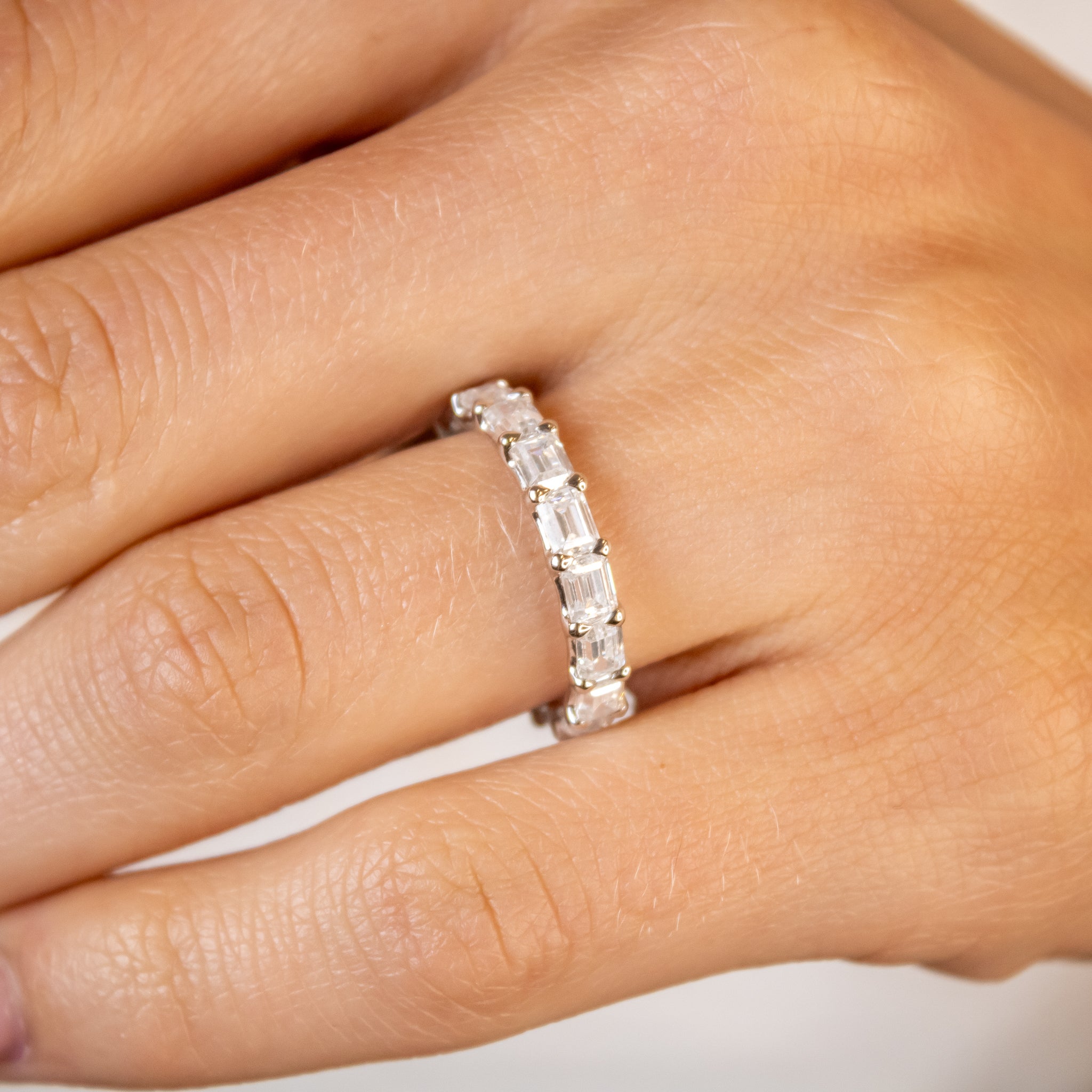 The Avery East West Emerald Cut Eternity Ring