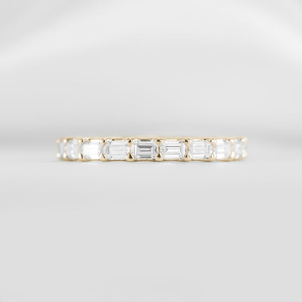 Avery east west emerald cut lab grown eternity 14K yellow gold wedding band by Lisa Robin#color_14k-yellow-gold