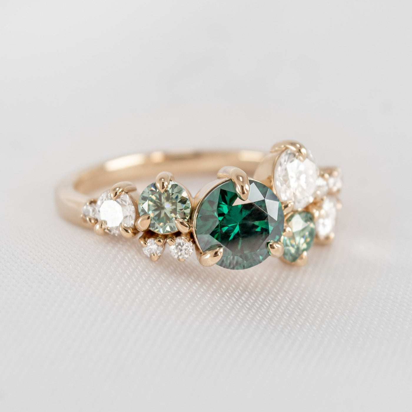 The Chloe Emerald Center and Diamond and Emerald Accent Cluster Engagement Ring | Lisa Robin