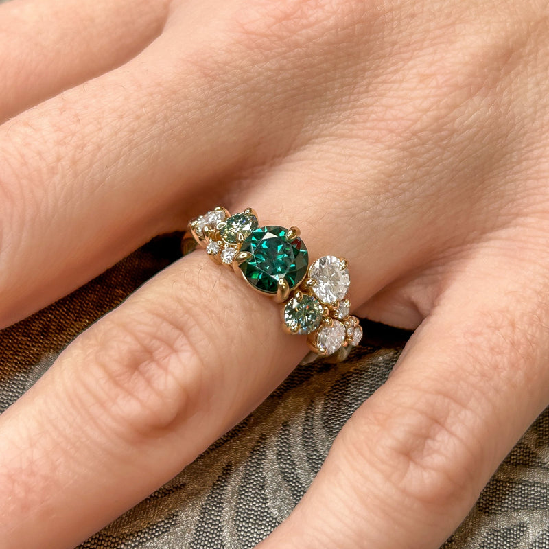 The Chloe Emerald Center and Diamond and Emerald Accent Cluster Engagement Ring | Lisa Robin