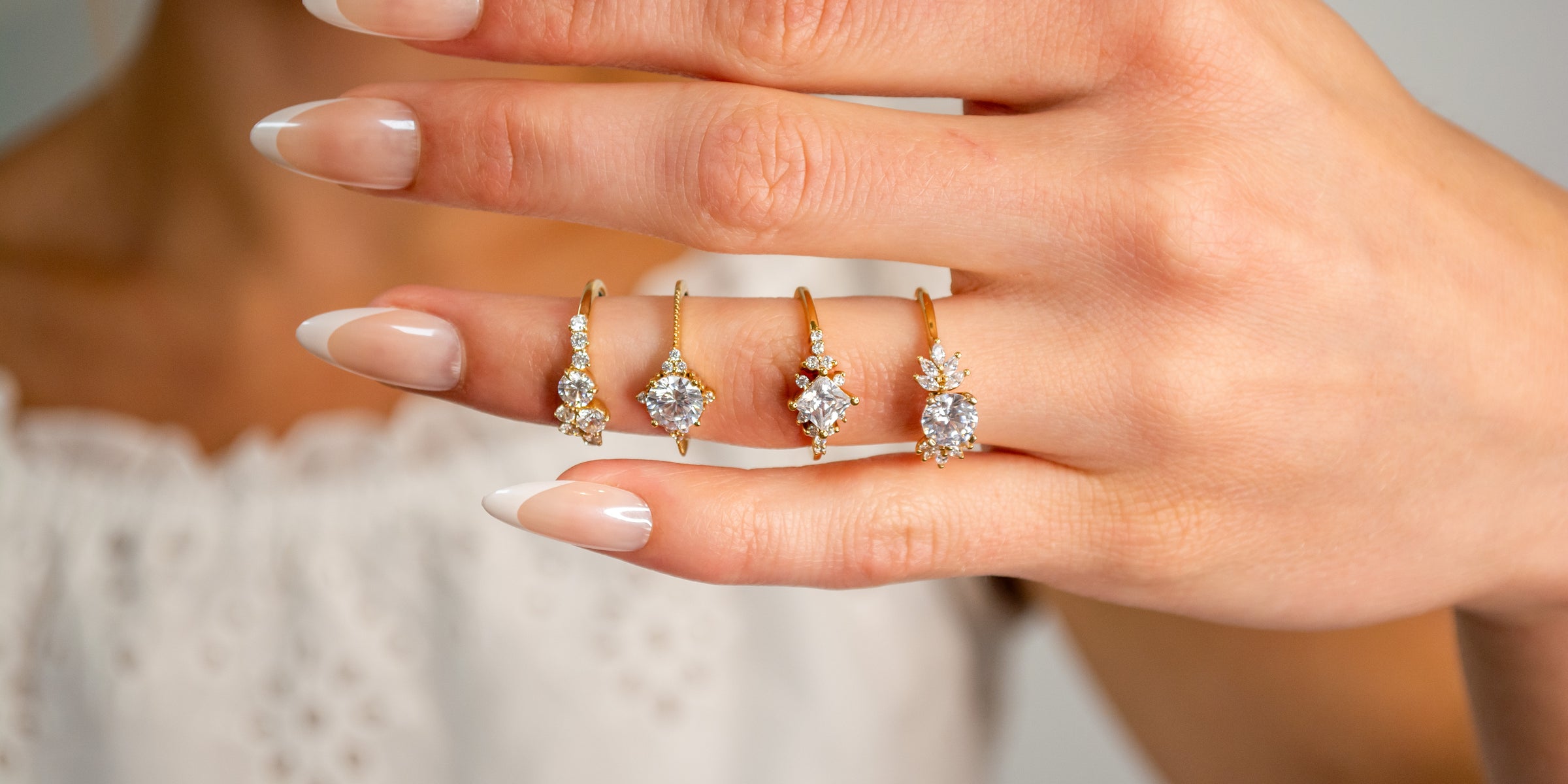 Cluster diamond engagement rings styles displayed on model | Lisa Robin