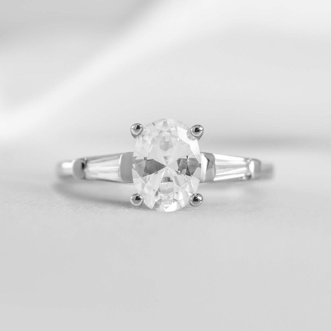 Shown in 1.0 carat * The Devon Three Stone Engagement Ring with Baguettes#shape_oval