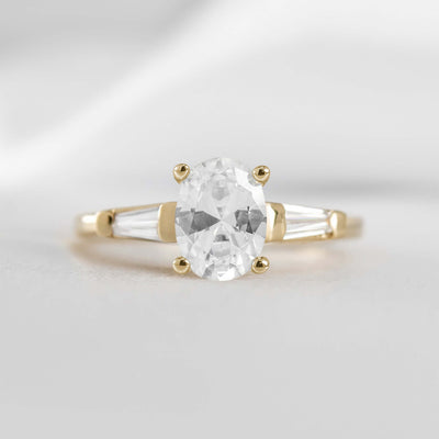 Shown in 1.0 carat * The Devon Three Stone Engagement Ring with Baguettes#shape_oval