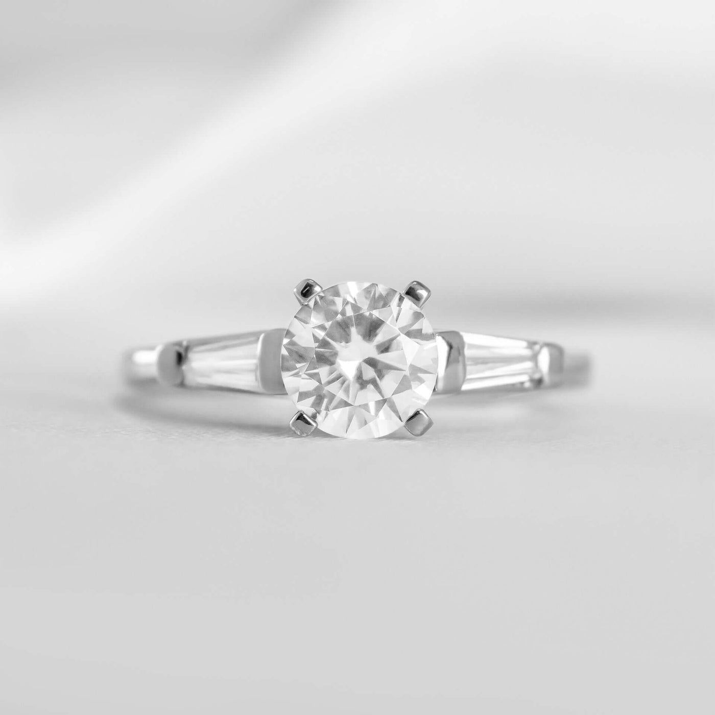Shown in 1.0 carat * The Devon Three Stone Engagement Ring with Baguettes#shape_round