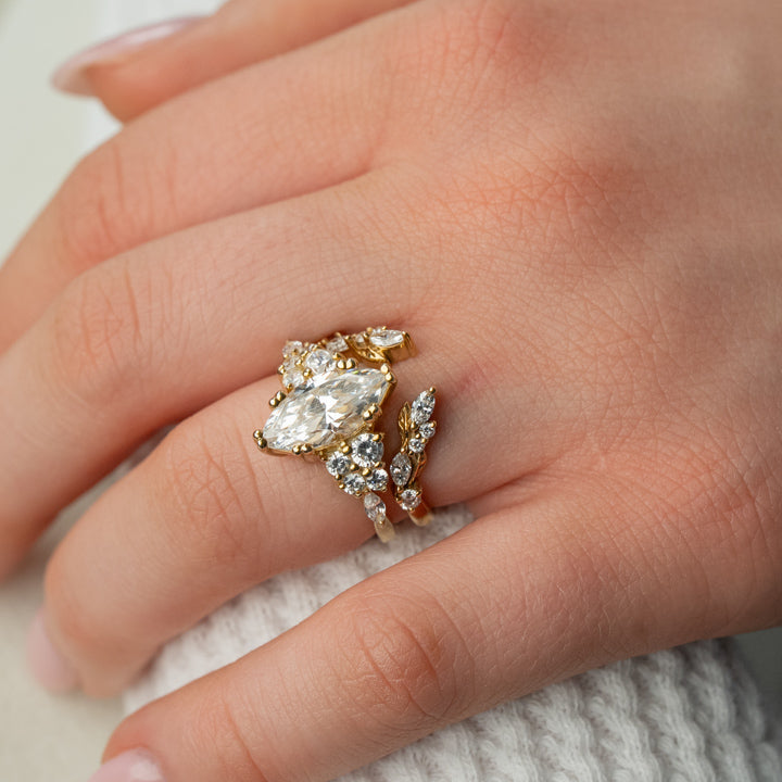 Shown in 2 Carat Diamond*The Dorothy Cluster Double Prong Engagement Ring with marquise cut diamond in yellow gold on model hand by Lisa Robin Jewelry