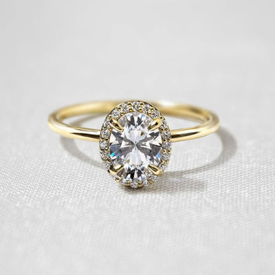 Shown in 1.0 Carat * The Emma Oval Diamond Halo Engagement Ring in yellow Gold | Lisa Robin#color_18k-yellow-gold