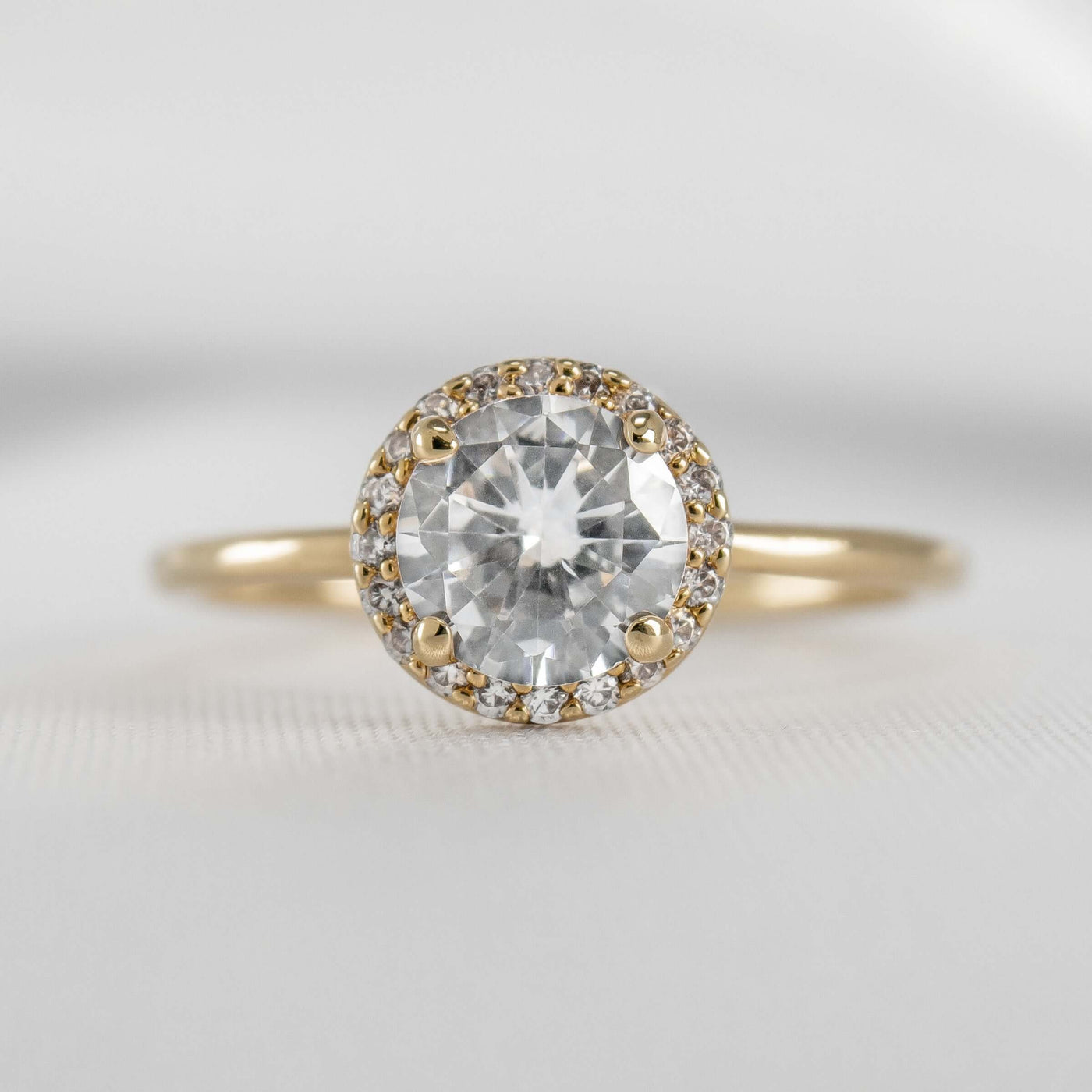 Shown  in 1.0 Carat * The Emma Round Diamond Halo Engagement Ring in yellow Gold | Lisa Robin#color_18k-yellow-gold
