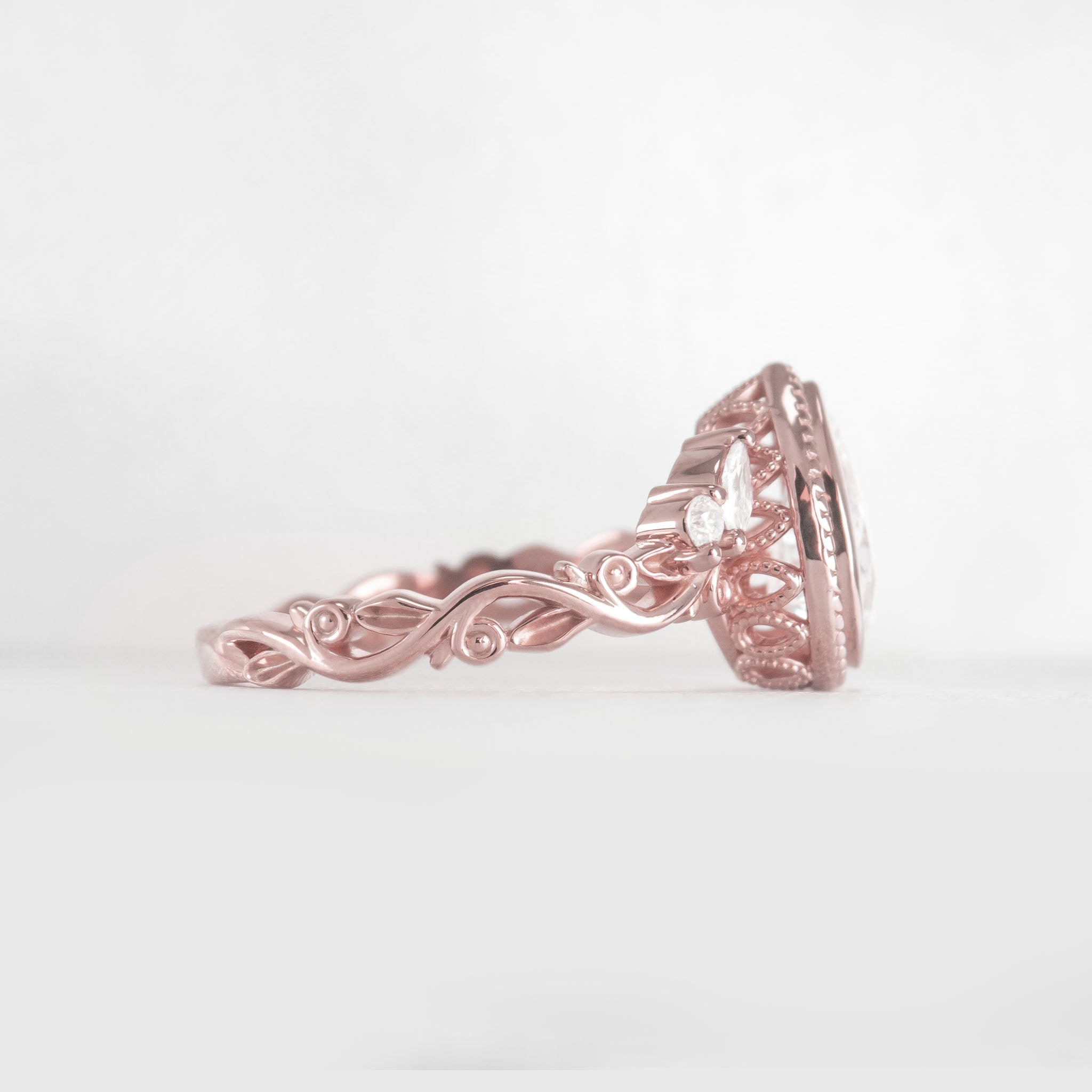 Shown in 2 Carat Diamond*The Fable victorian style bezel Engagement Ring with pear cut diamond in rose gold from side view by Lisa Robin#color_14k-rose-gold