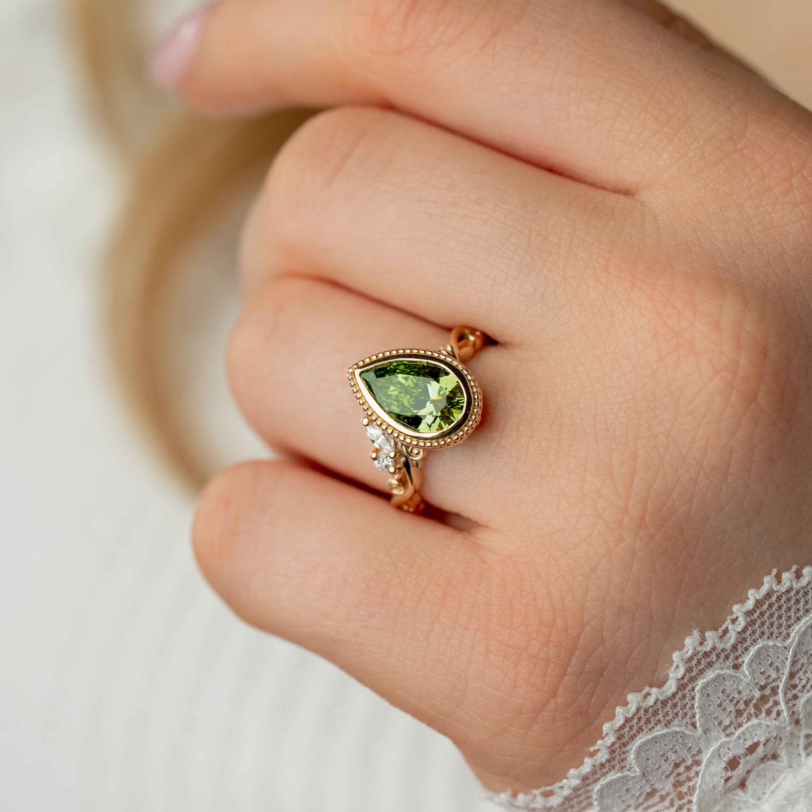 Shown in 2 Carat Diamond*The Fable victorian style bezel Engagement Ring with green pear cut diamond in yellow gold on model by Lisa Robin#color_14k-yellow-gold