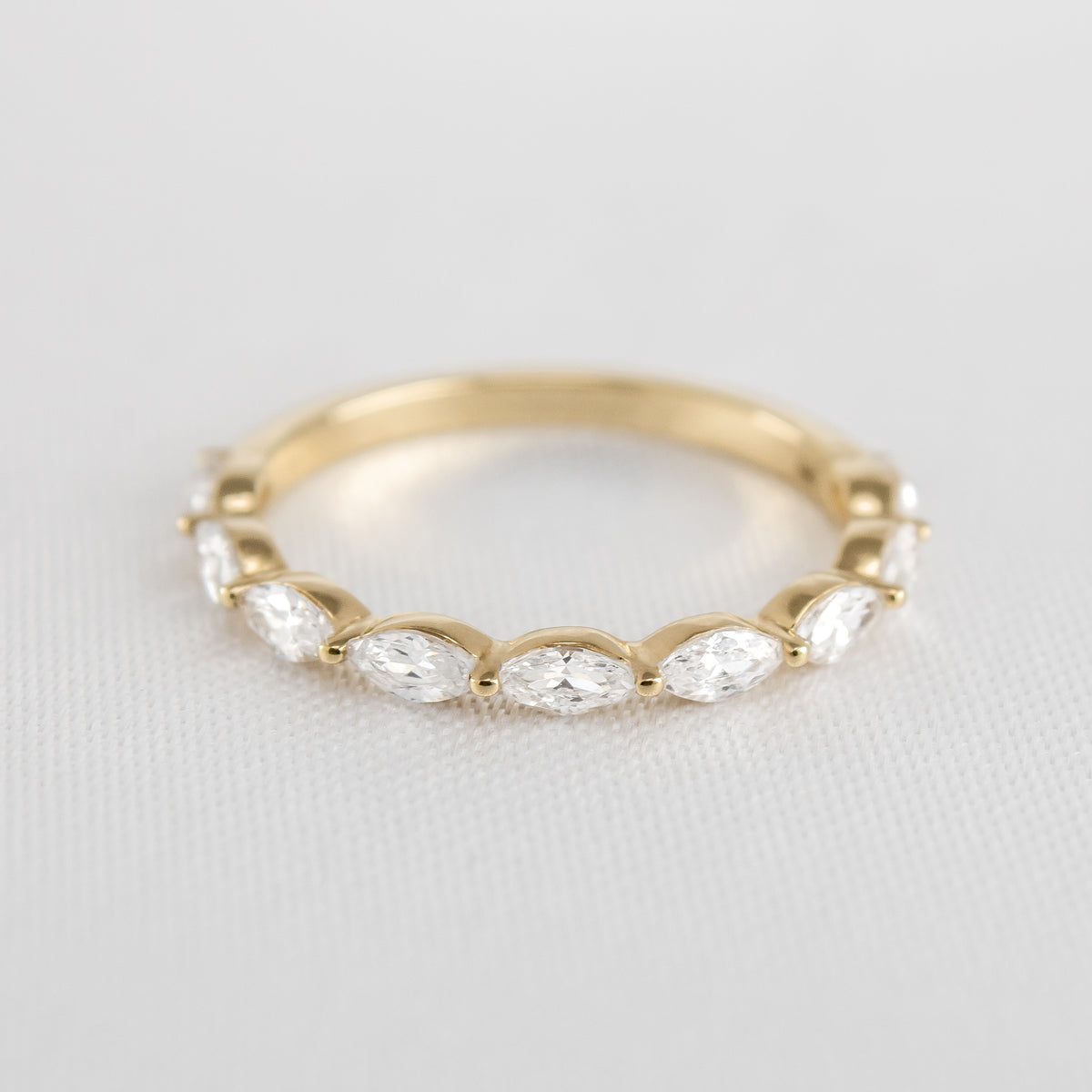Finley marquise natural diamond 14K yellow gold wedding ring from top angle by Lisa Robin#color_14k-yellow-gold