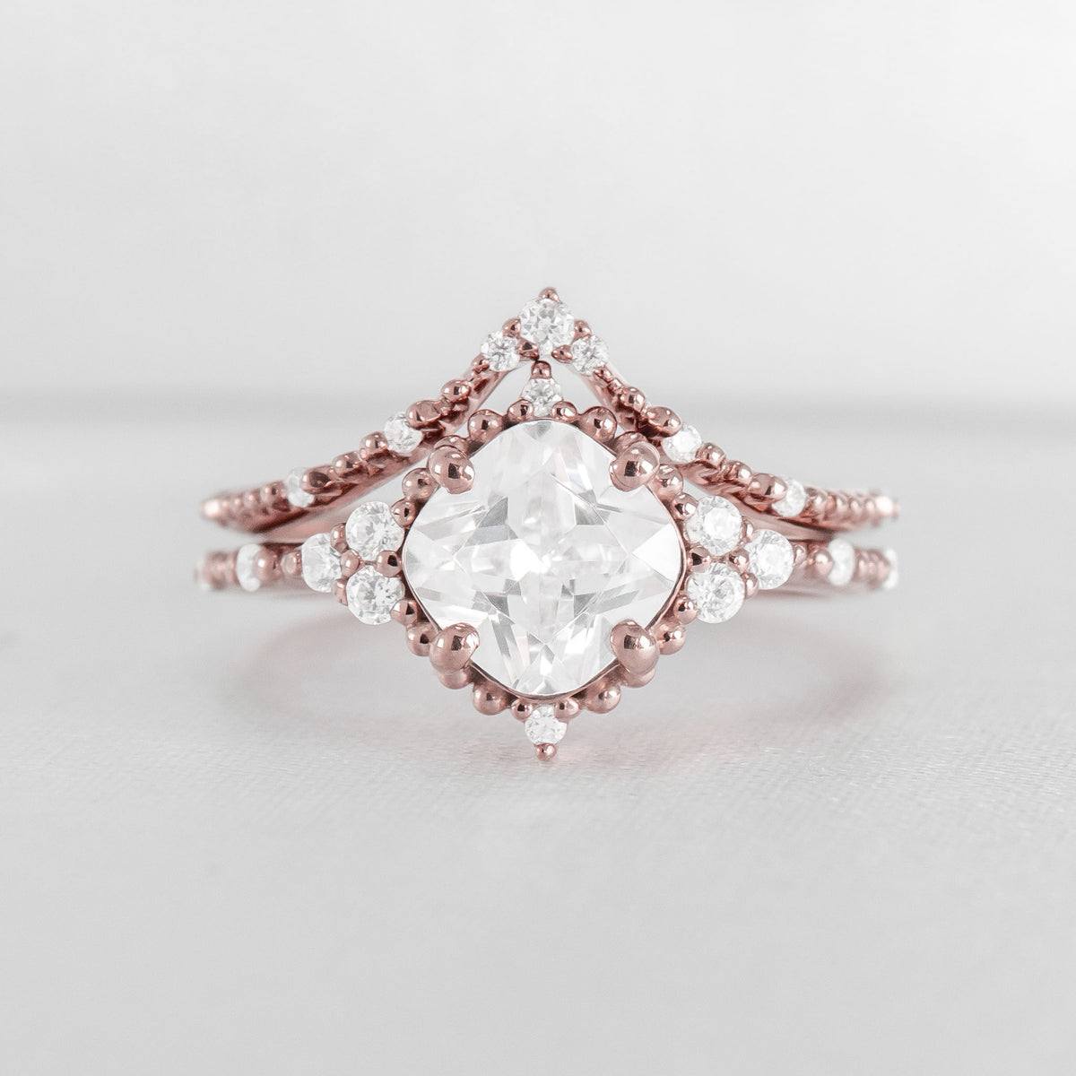 Shown in 2 Carat Diamond*The Galaeth Cluster Diamond Engagement Ring with cushion cut diamond in rose gold with the Maeve curved lab diamond 14K rose gold wedding band by Lisa Robin#color_14k-rose-gold