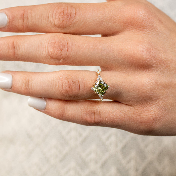Shown in 2 Carat Diamond*The Galaeth Green Cluster Diamond Engagement Ring with cushion cut diamond in yellow gold on model hand by Lisa Robin#color_14k-yellow-gold