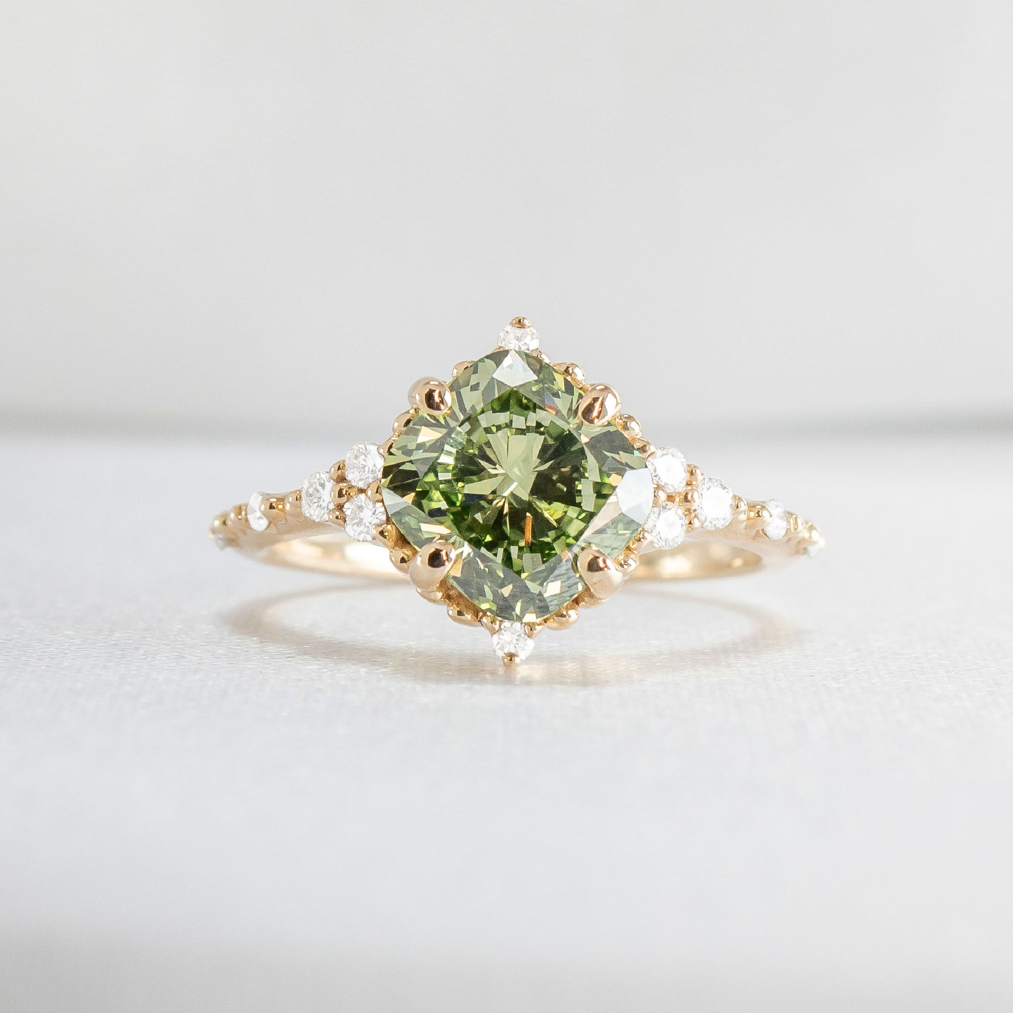 Shown in 2 Carat Diamond*The Galaeth Green Cluster Diamond Engagement Ring with cushion cut diamond in yellow gold from front by Lisa Robin#color_14k-yellow-gold