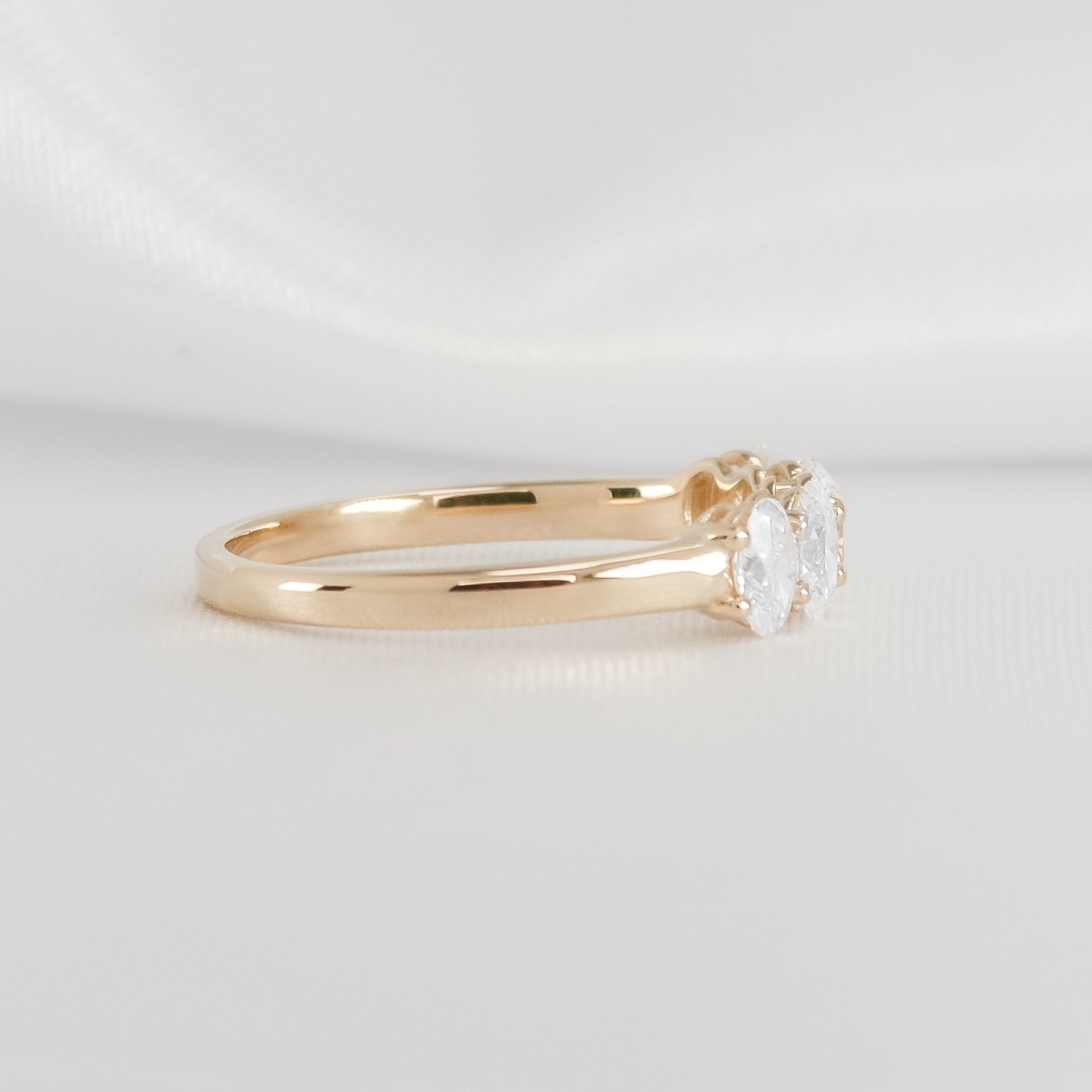The Guthrie 5 Stone Oval Diamond Wedding Ring in 14K yellow gold from side view by Lisa Robin#color_14k-yellow-gold