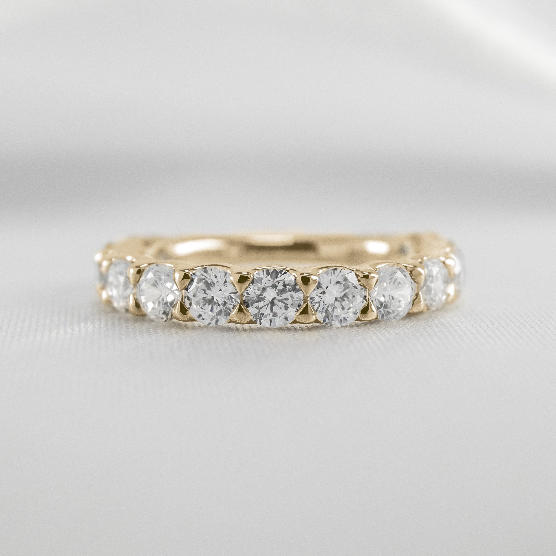 Shown in 1 Carat Diamonds*The Harper Round Diamond 14K yellow gold half eternity Wedding ring front view by Lisa Robin#color_14k-yellow-gold