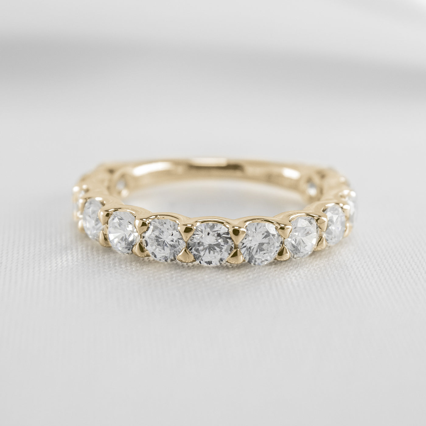 Shown in 1 carat * The Harper round 13-stone eternity diamond wedding band | Lisa Robin#color_18k-yellow-gold