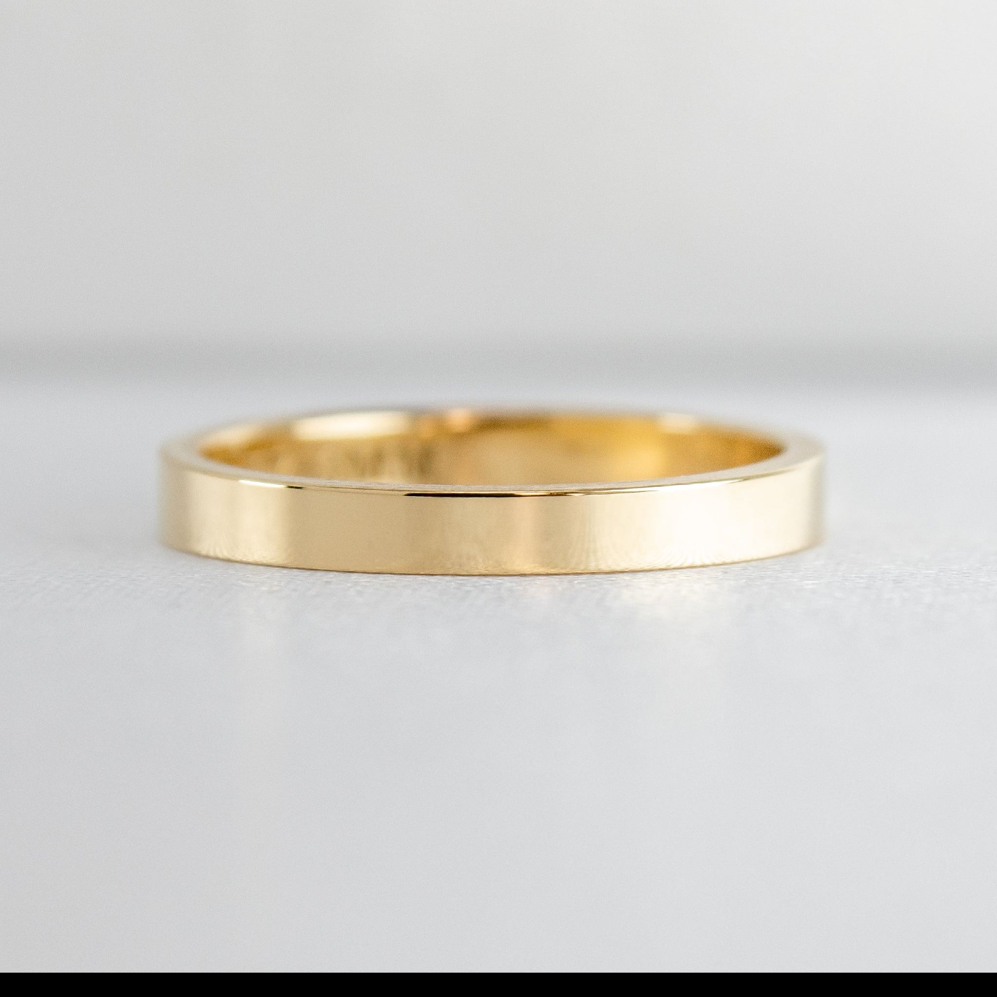 The Jamie 2mm wide Flat 14K yellow gold Wedding ring front view by Lisa Robin#color_14k-yellow-gold