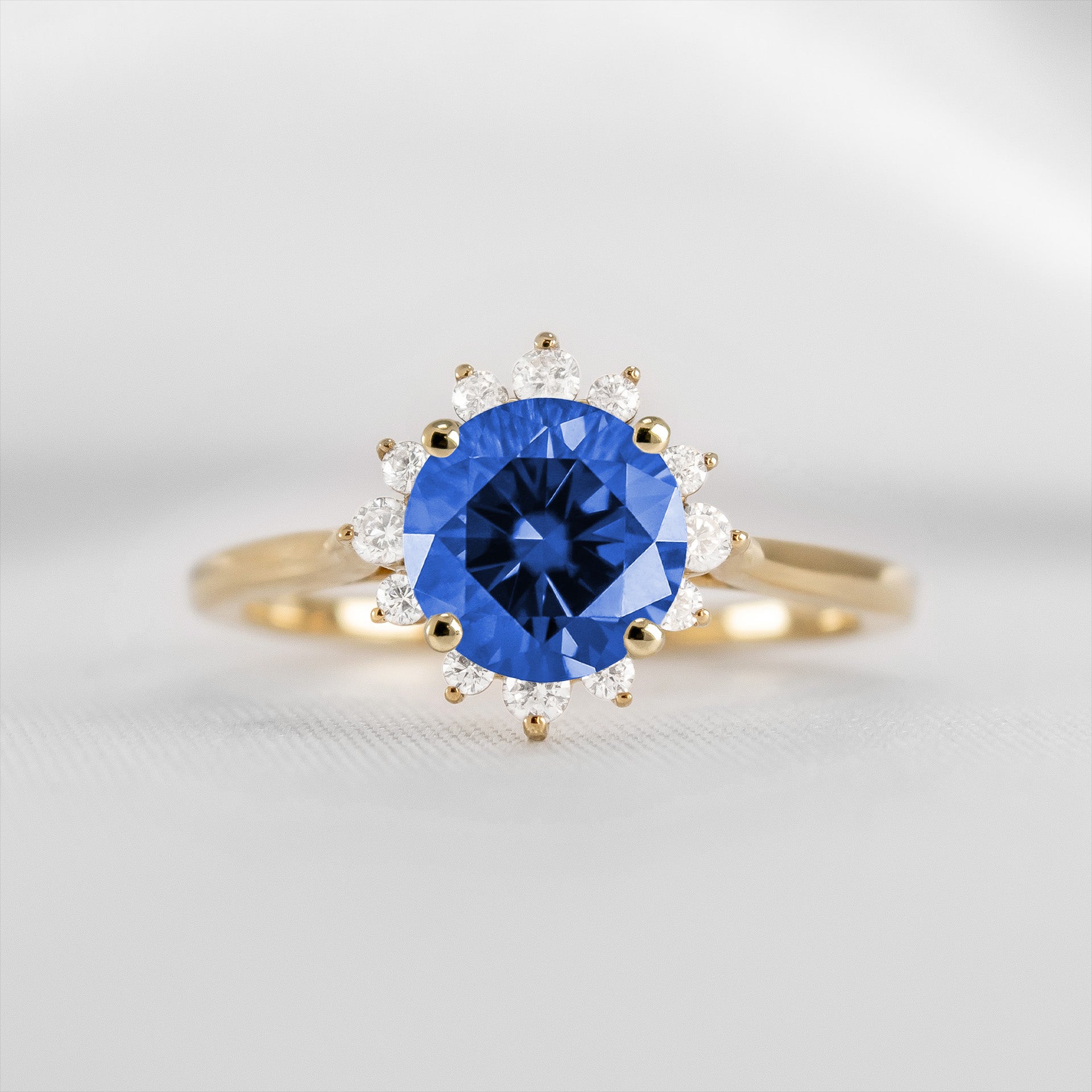 Shown in 1.0 carat Blue Sapphire* The Jaylin Blue Sapphire with Diamond Halo Engagement Ring | Lisa Robin#color_14k-yellow-gold